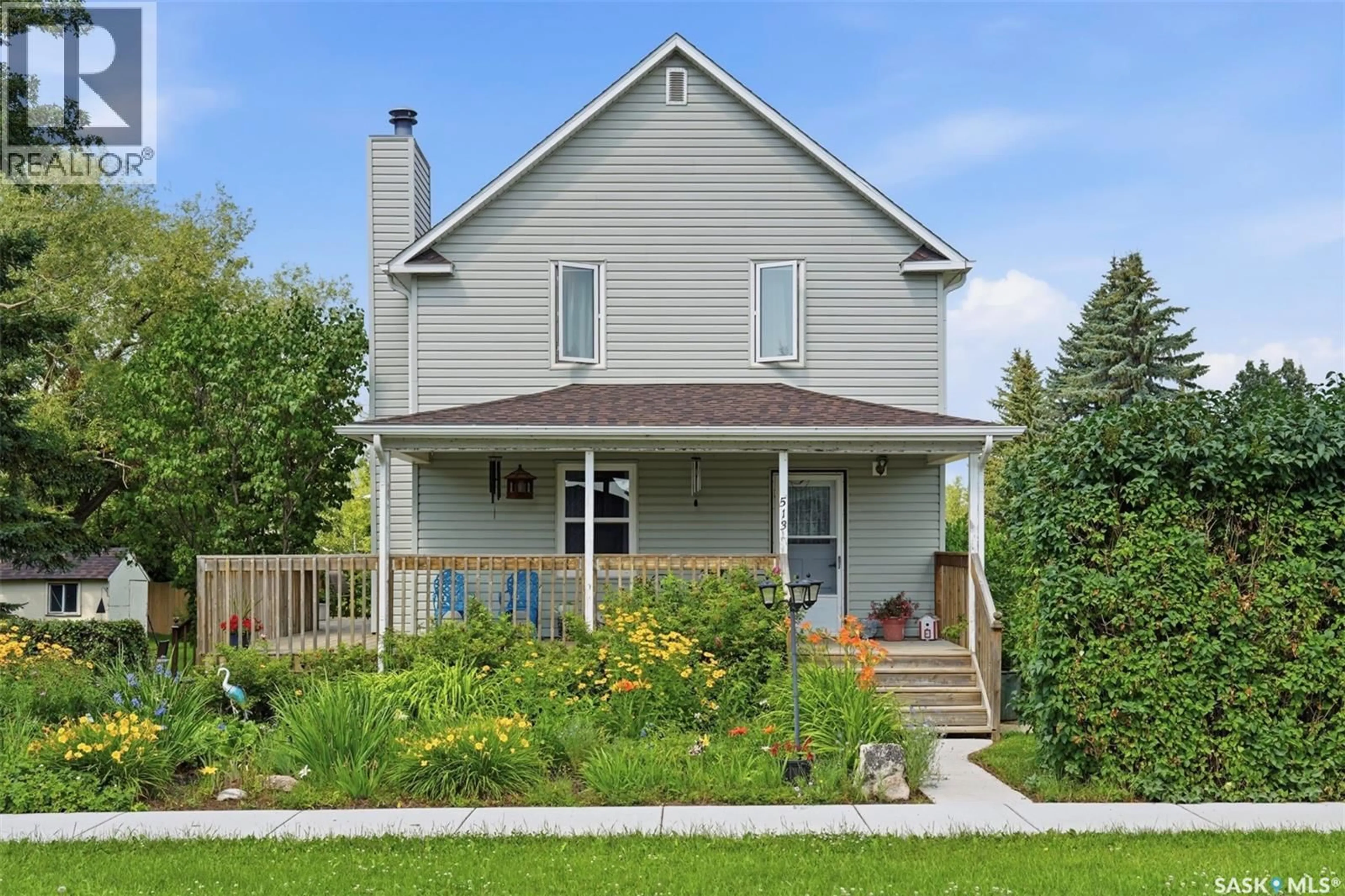 Home with vinyl exterior material, street for 513 1ST STREET, Hepburn Saskatchewan S0K1Z0