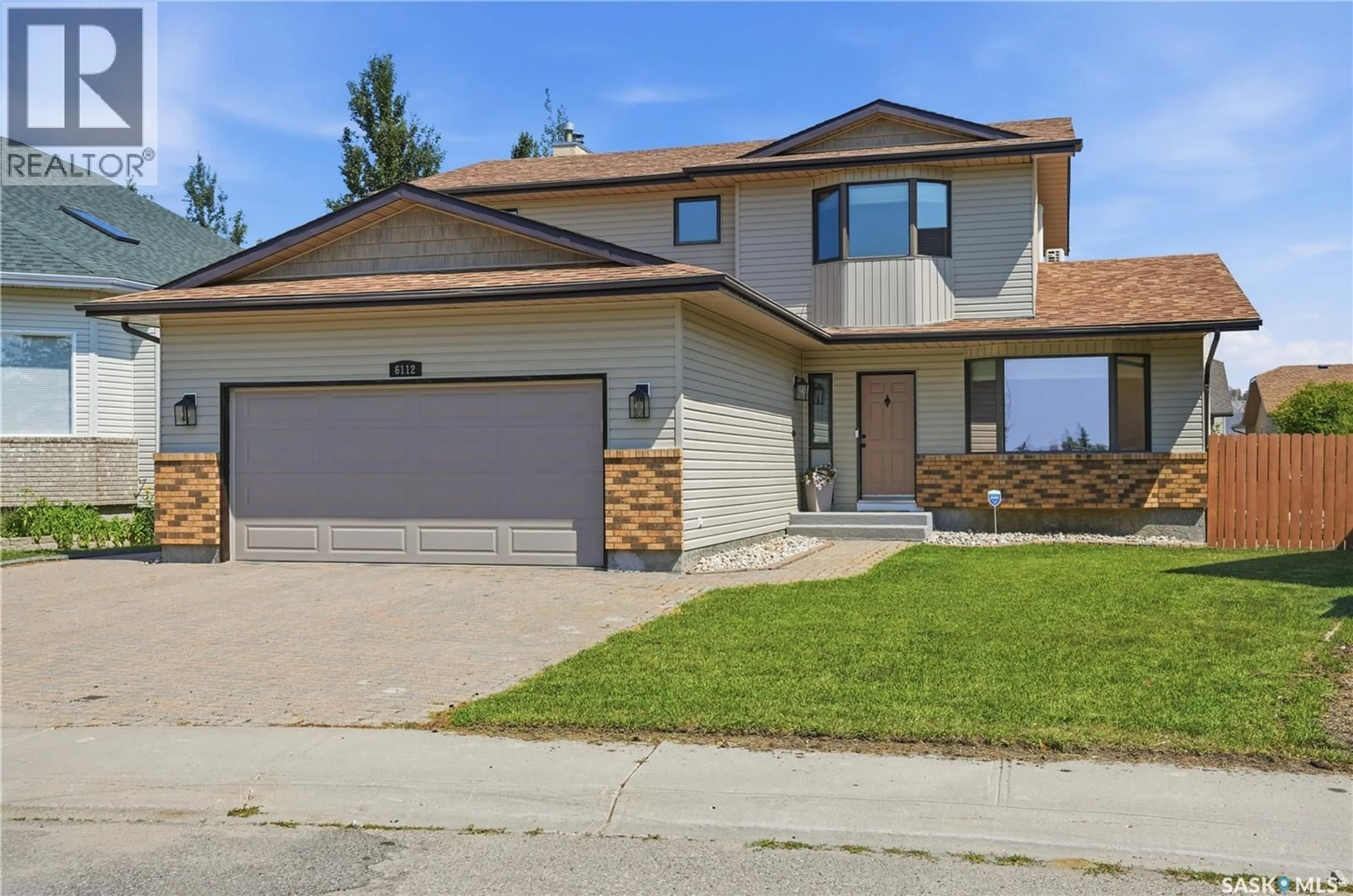 Home with vinyl exterior material, street for 6112 BRUNSKILL PLACE, Regina Saskatchewan S4T7W7