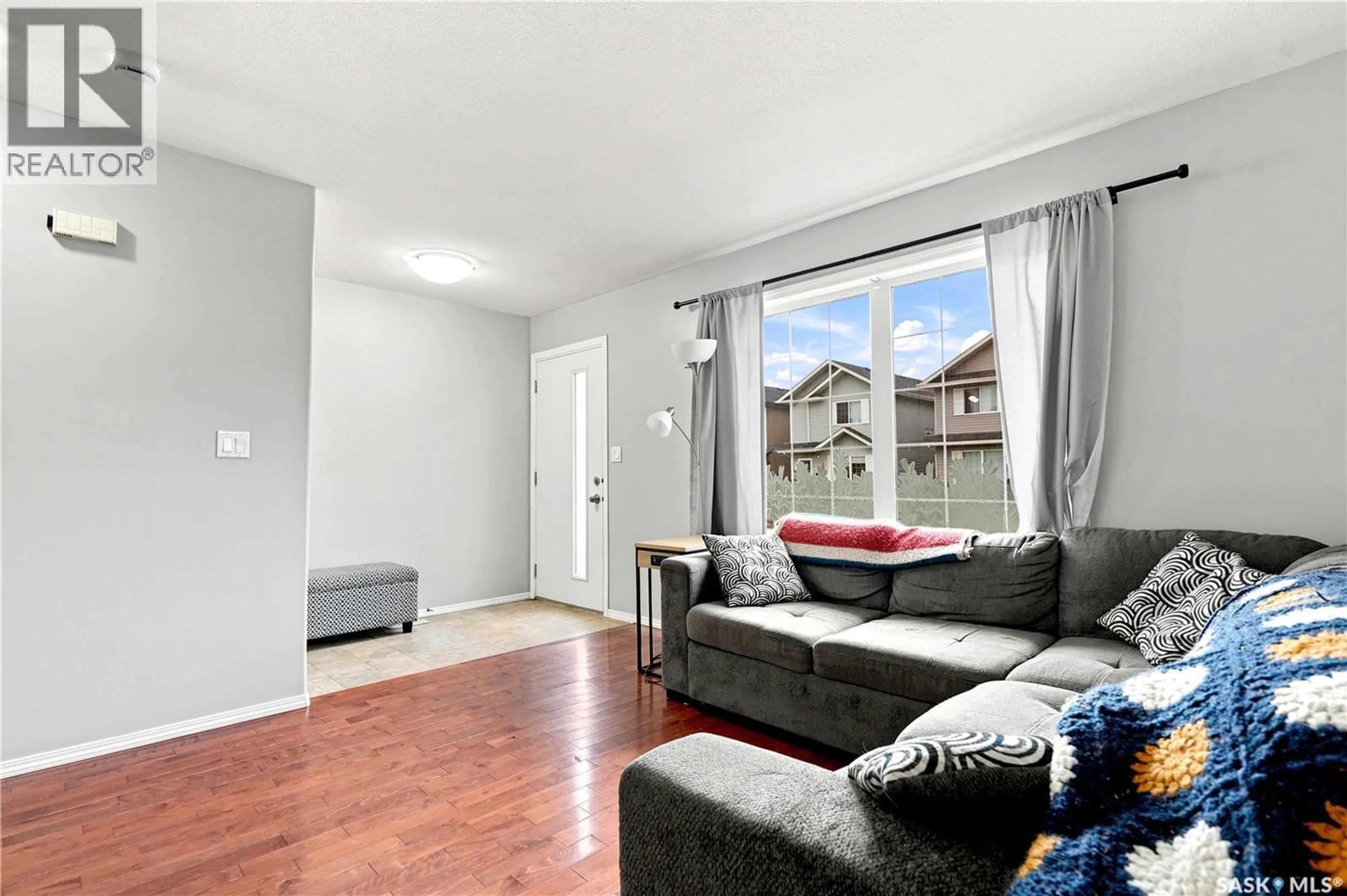 Living room with furniture, unknown for 435 BLAKENEY CRESCENT, Saskatoon Saskatchewan S7L7N5