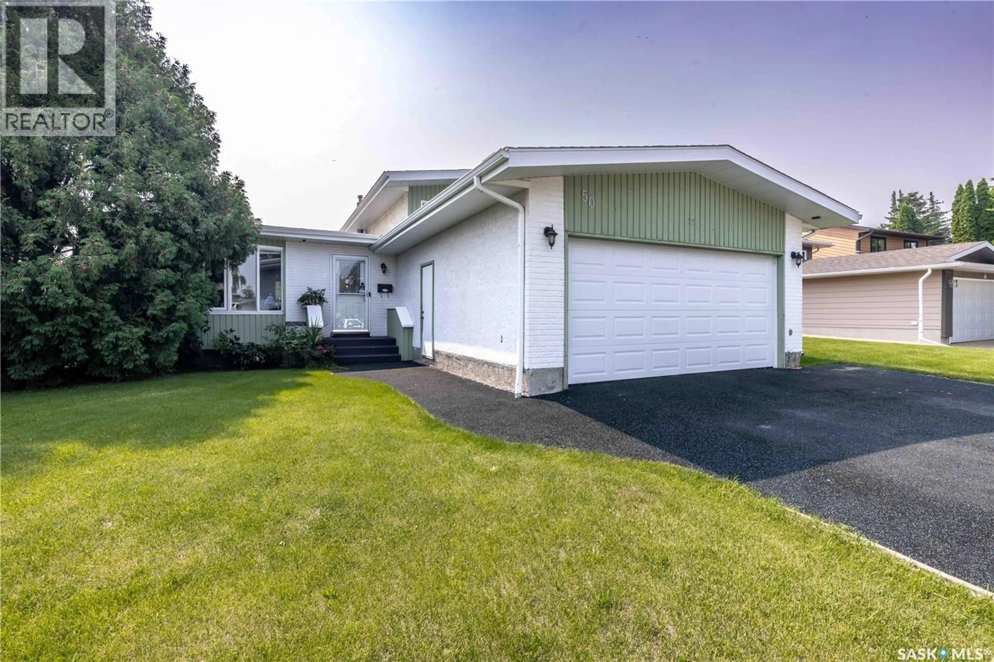 Home with vinyl exterior material, street for 50 MANITOU COURT, Saskatoon Saskatchewan S7K5G3