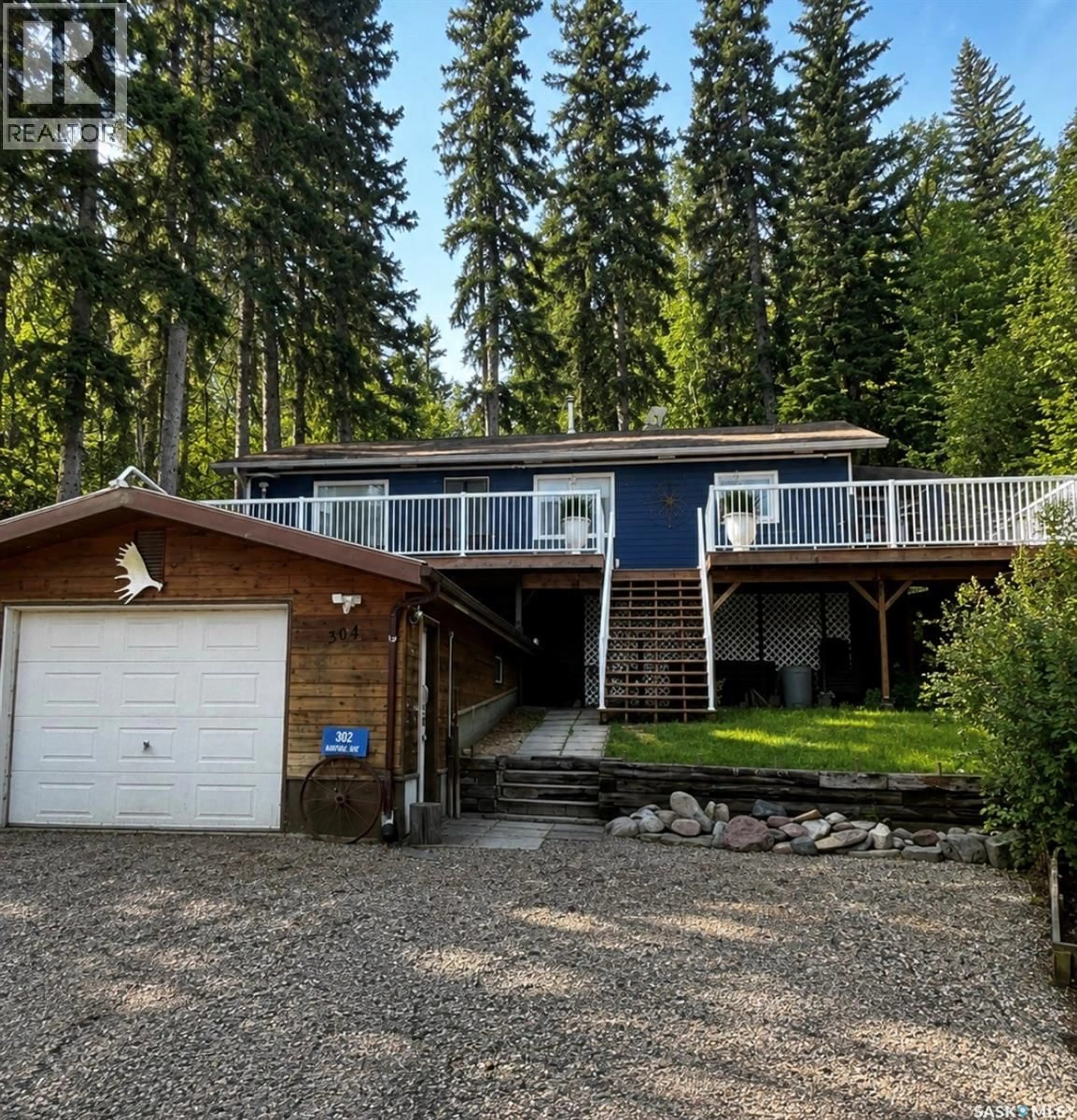 A pic from outside/outdoor area/front of a property/back of a property/a pic from drone, water/lake/river/ocean view for 302 BARRIER BAY, Barrier Lake Saskatchewan S0E0B0