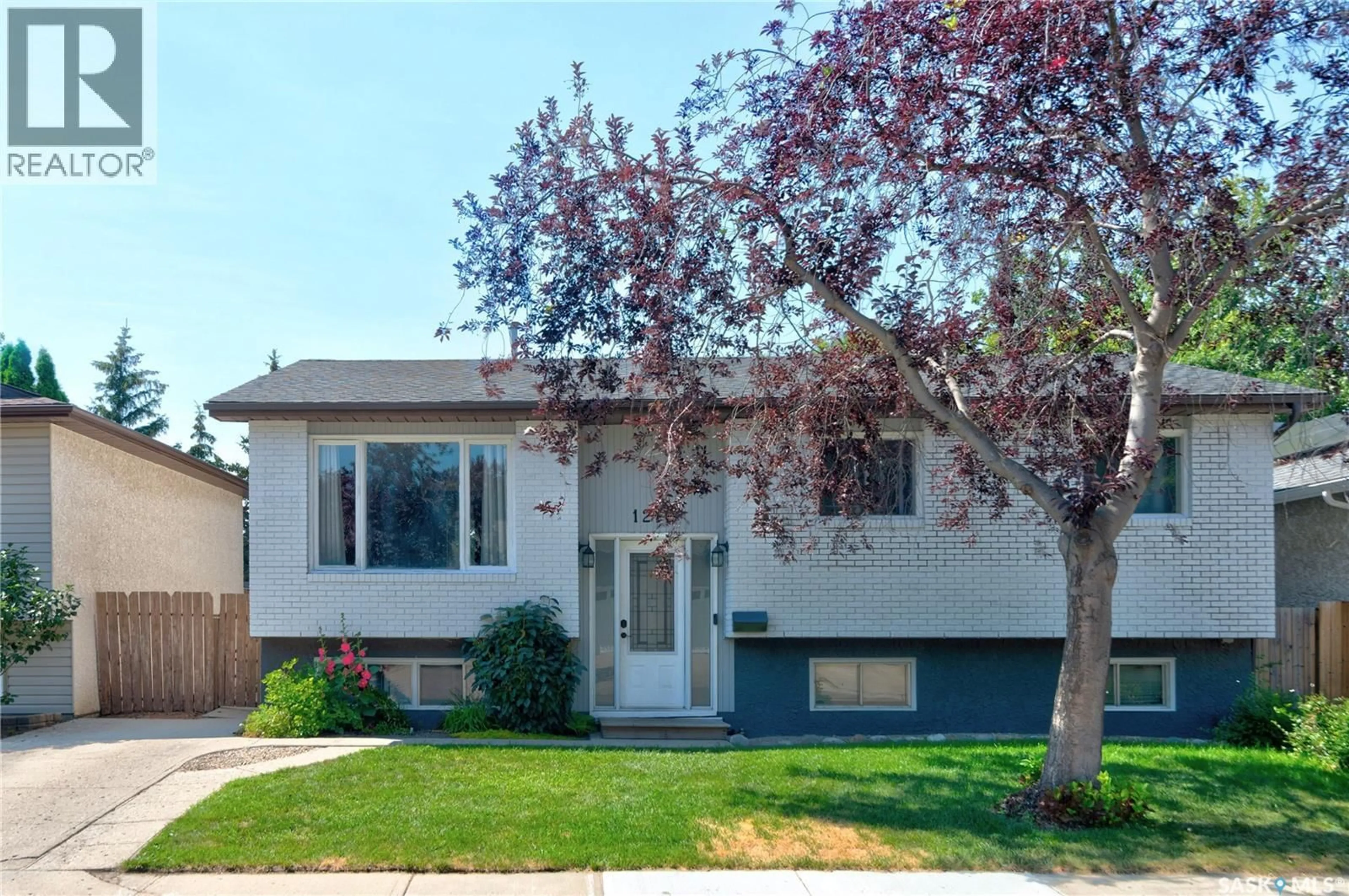 Home with vinyl exterior material, street for 1210 FLEXMAN CRESCENT, Regina Saskatchewan S4X3A7