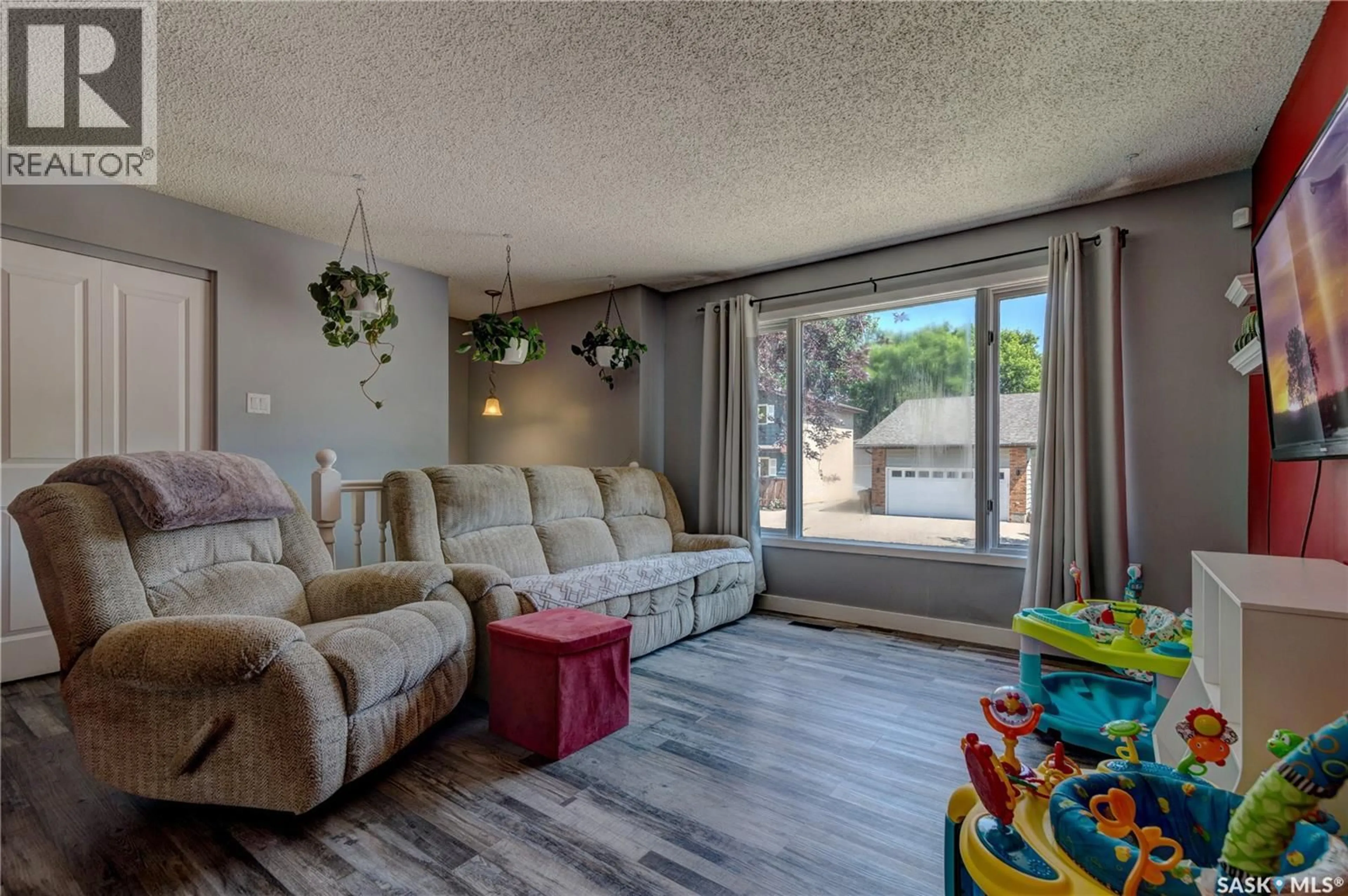 Living room with furniture, unknown for 1210 FLEXMAN CRESCENT, Regina Saskatchewan S4X3A7
