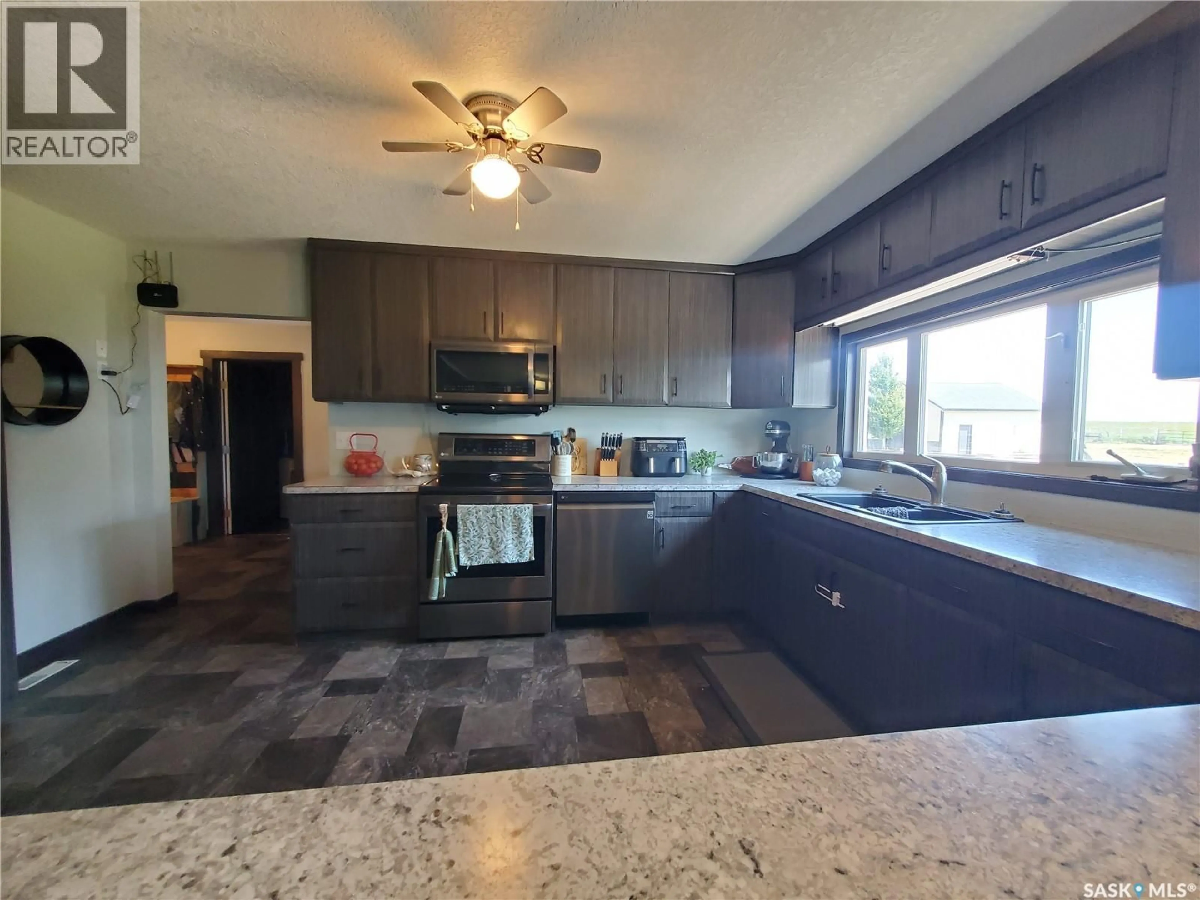 Open concept kitchen, ceramic/tile floor for NEVILLE ACREAGE, Neville Saskatchewan S0N1T0