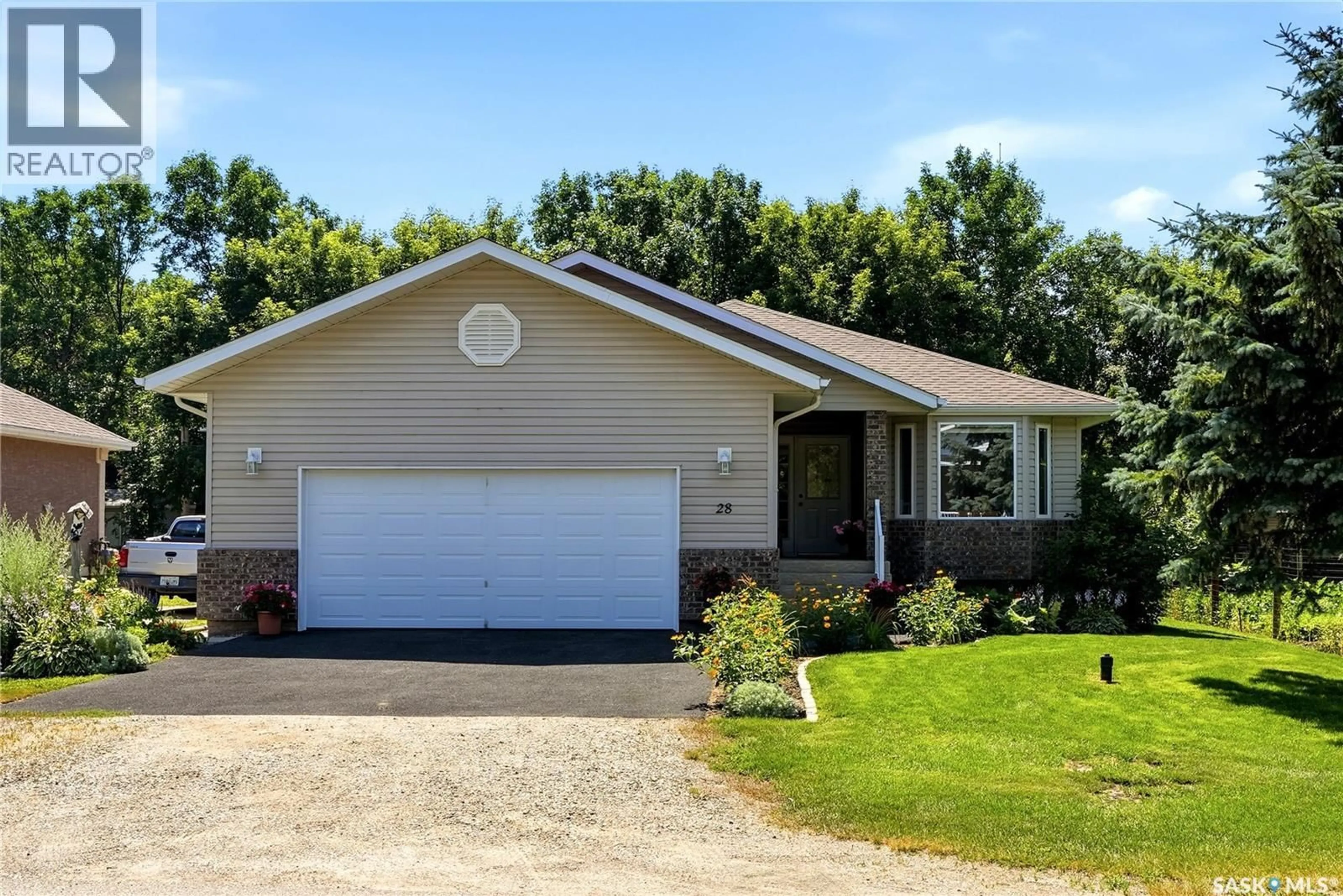 Home with vinyl exterior material, street for 28 ROSEDALE AVENUE, Katepwa Beach Saskatchewan S0G2K0