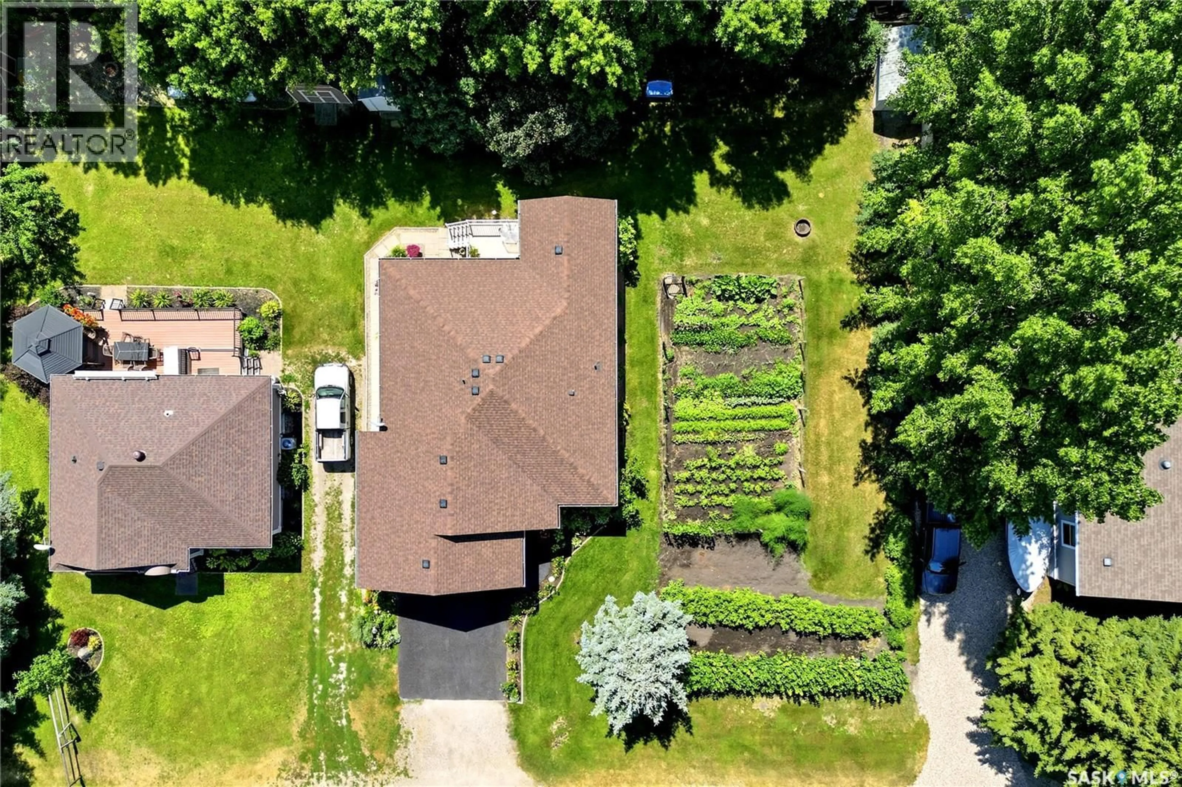 A pic from outside/outdoor area/front of a property/back of a property/a pic from drone, street for 28 ROSEDALE AVENUE, Katepwa Beach Saskatchewan S0G2K0