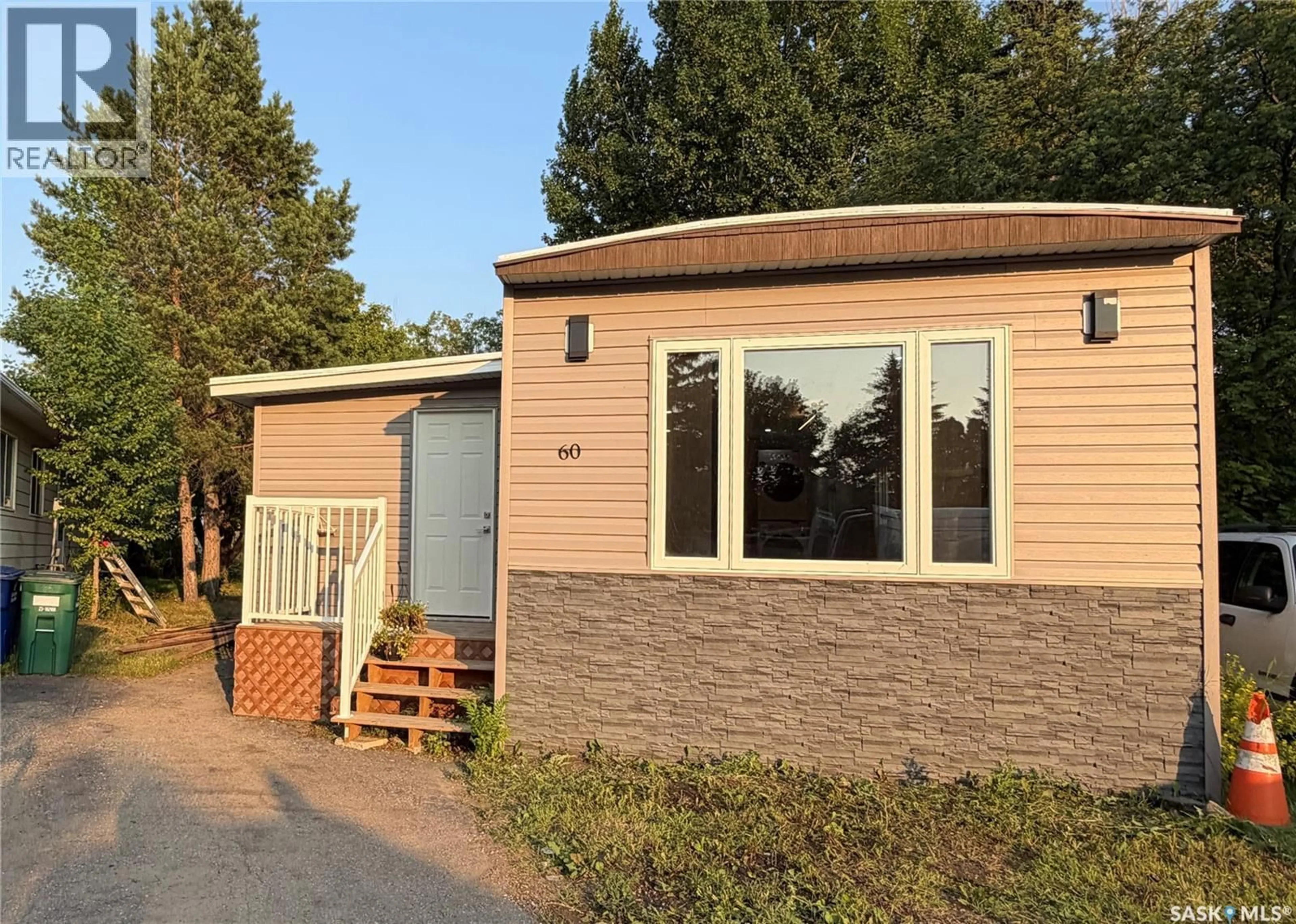 Home with vinyl exterior material, street for 60 1035 BOYCHUK DRIVE, Saskatoon Saskatchewan S7H5B2