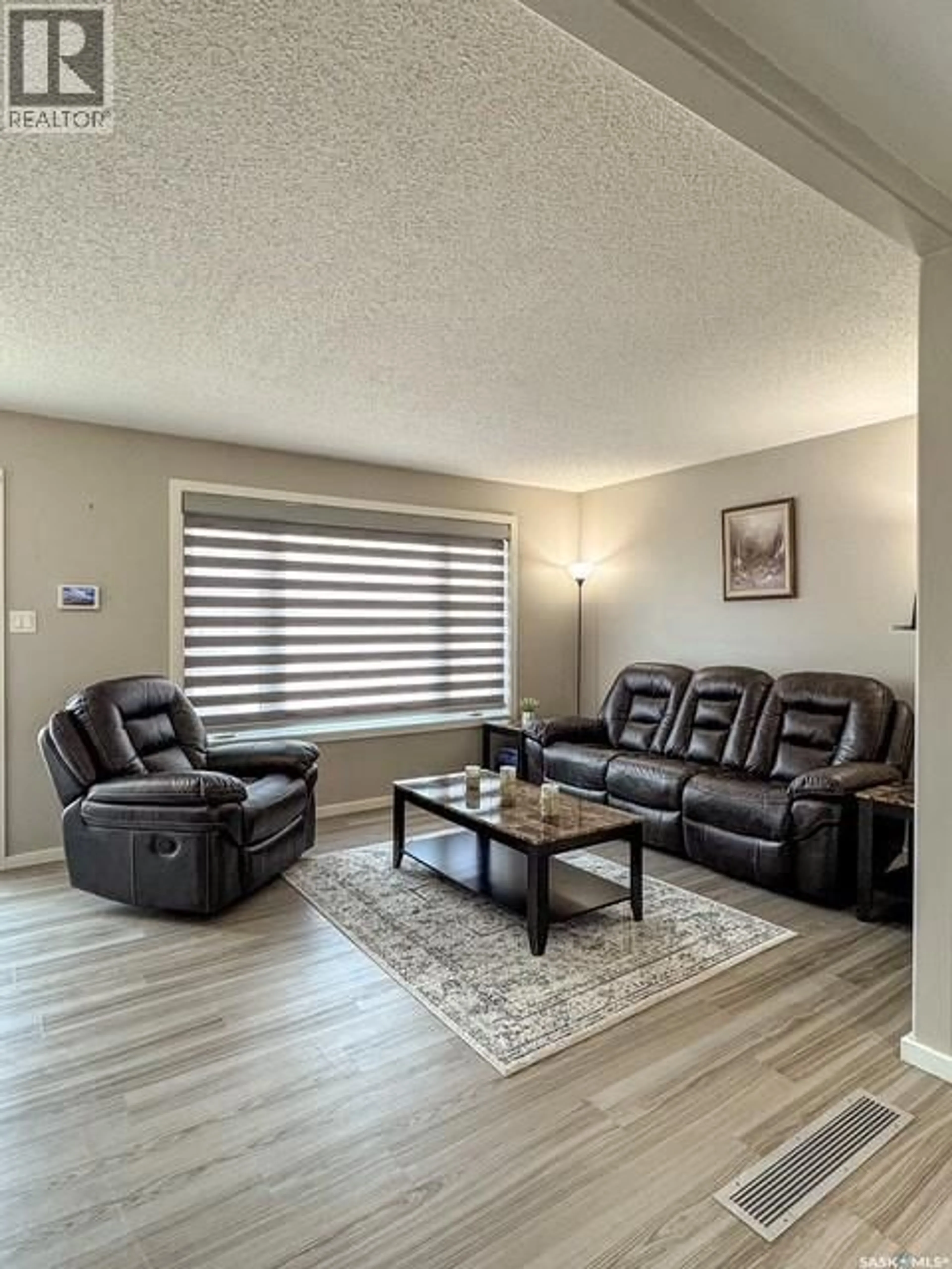Living room with furniture, unknown for 405 NORTHCOTE DRIVE, Swift Current Saskatchewan S9H4T7