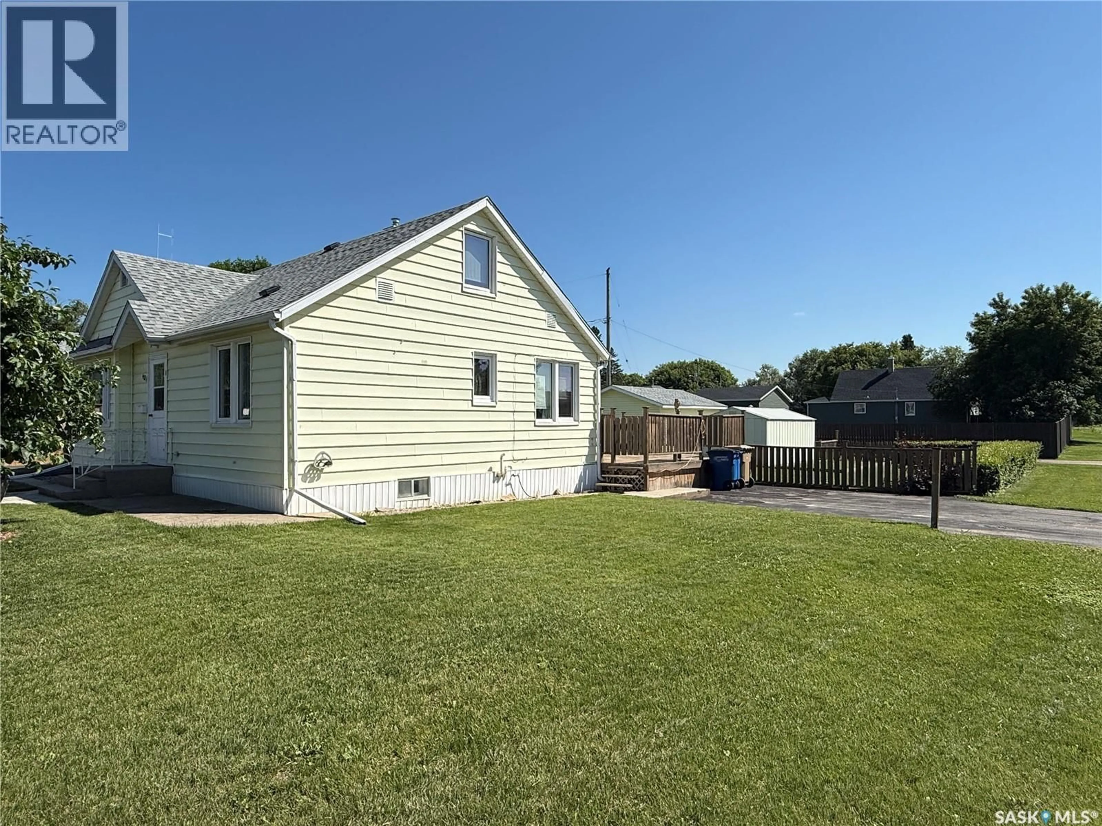 Home with vinyl exterior material, street for 401 2ND AVENUE, Shellbrook Saskatchewan S0J2E0