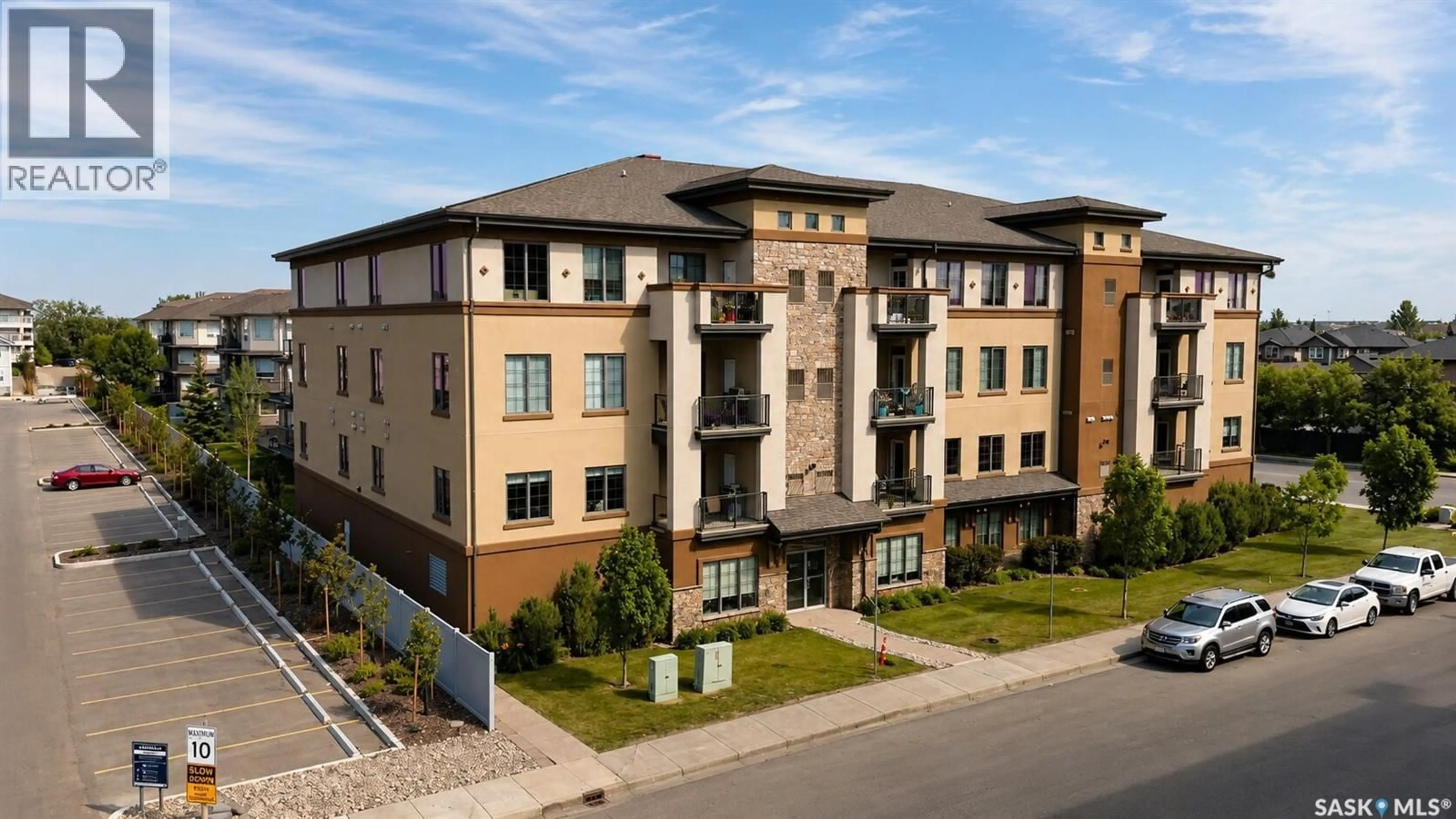A pic from outside/outdoor area/front of a property/back of a property/a pic from drone, building for 205 - 3702 HAUGHTON ROAD, Regina Saskatchewan S4V3K1
