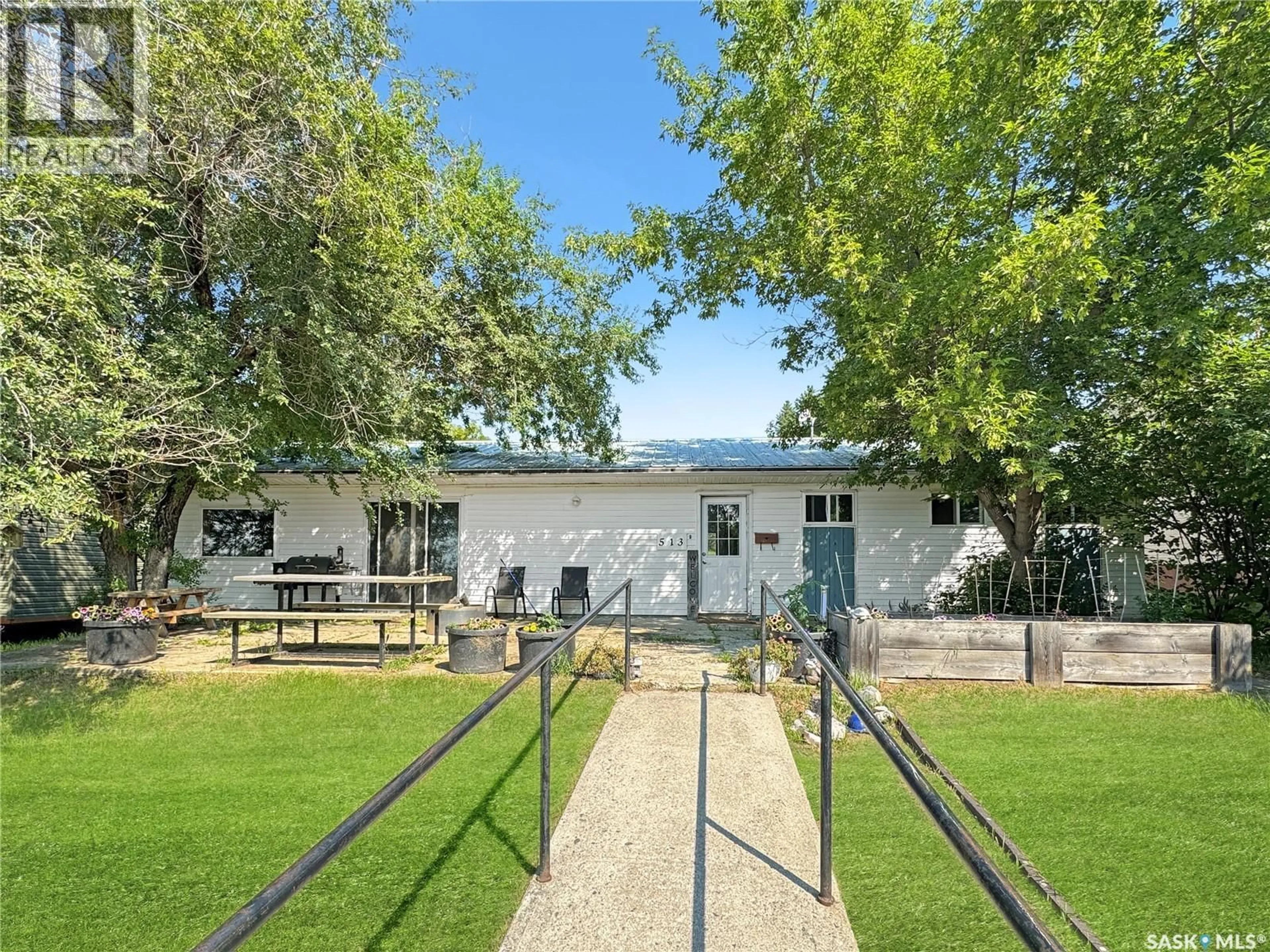 A pic from outside/outdoor area/front of a property/back of a property/a pic from drone, street for 513 MAIN STREET, Turtleford Saskatchewan S0M2Y0
