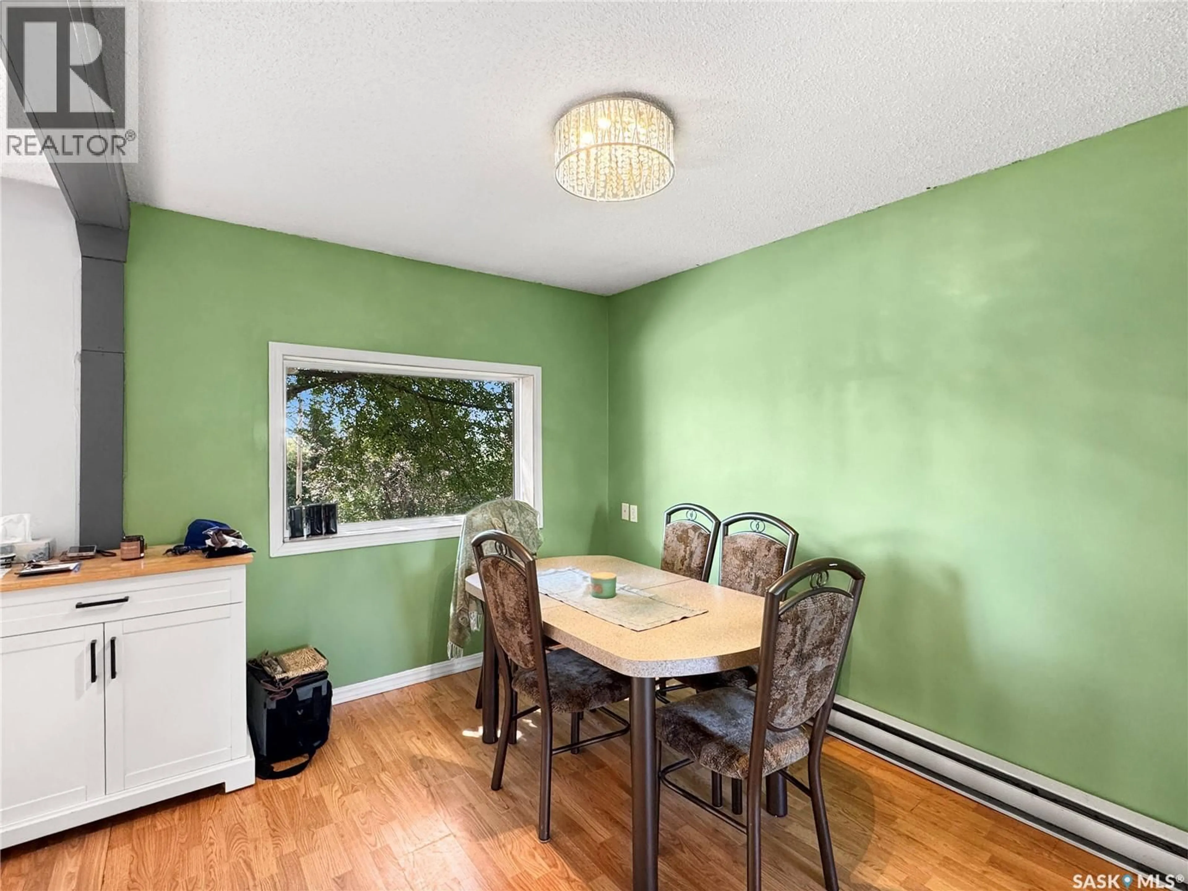 Dining room, wood/laminate floor for 513 MAIN STREET, Turtleford Saskatchewan S0M2Y0