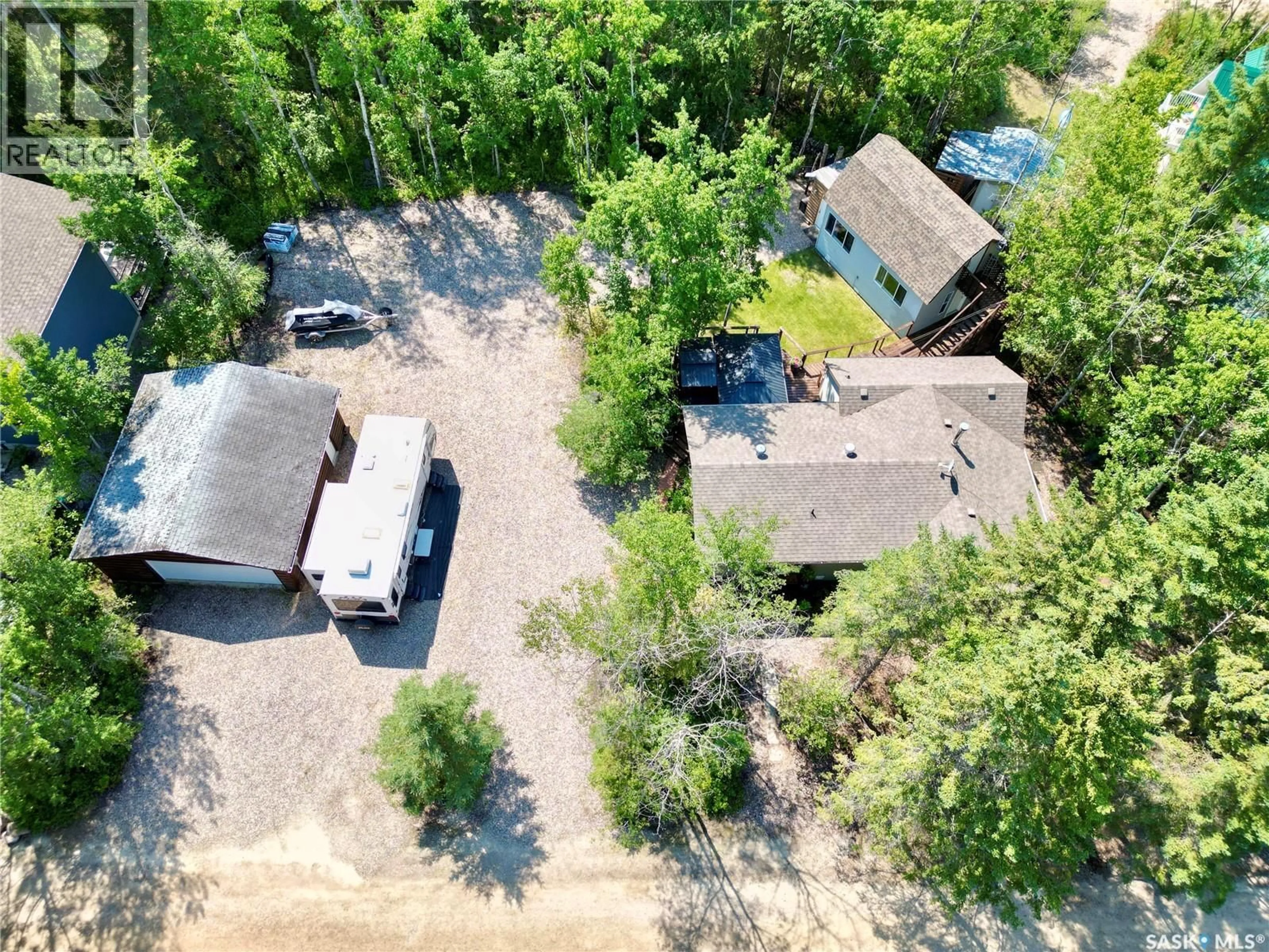 A pic from outside/outdoor area/front of a property/back of a property/a pic from drone, street for 1306 KEWATIN LANE, Turtle Lake Saskatchewan S0M1J0