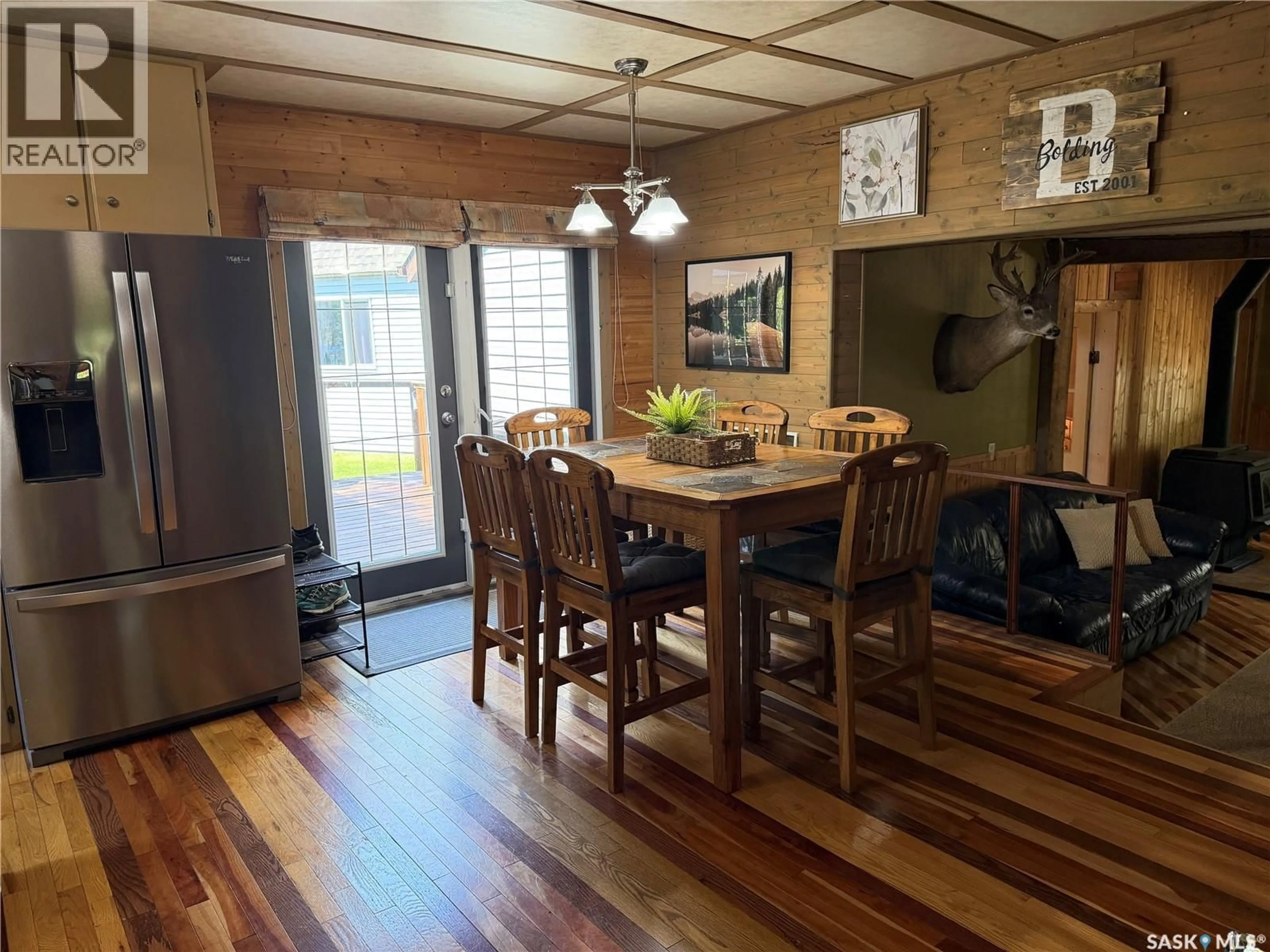 Dining room, wood/laminate floor for 1306 KEWATIN LANE, Turtle Lake Saskatchewan S0M1J0