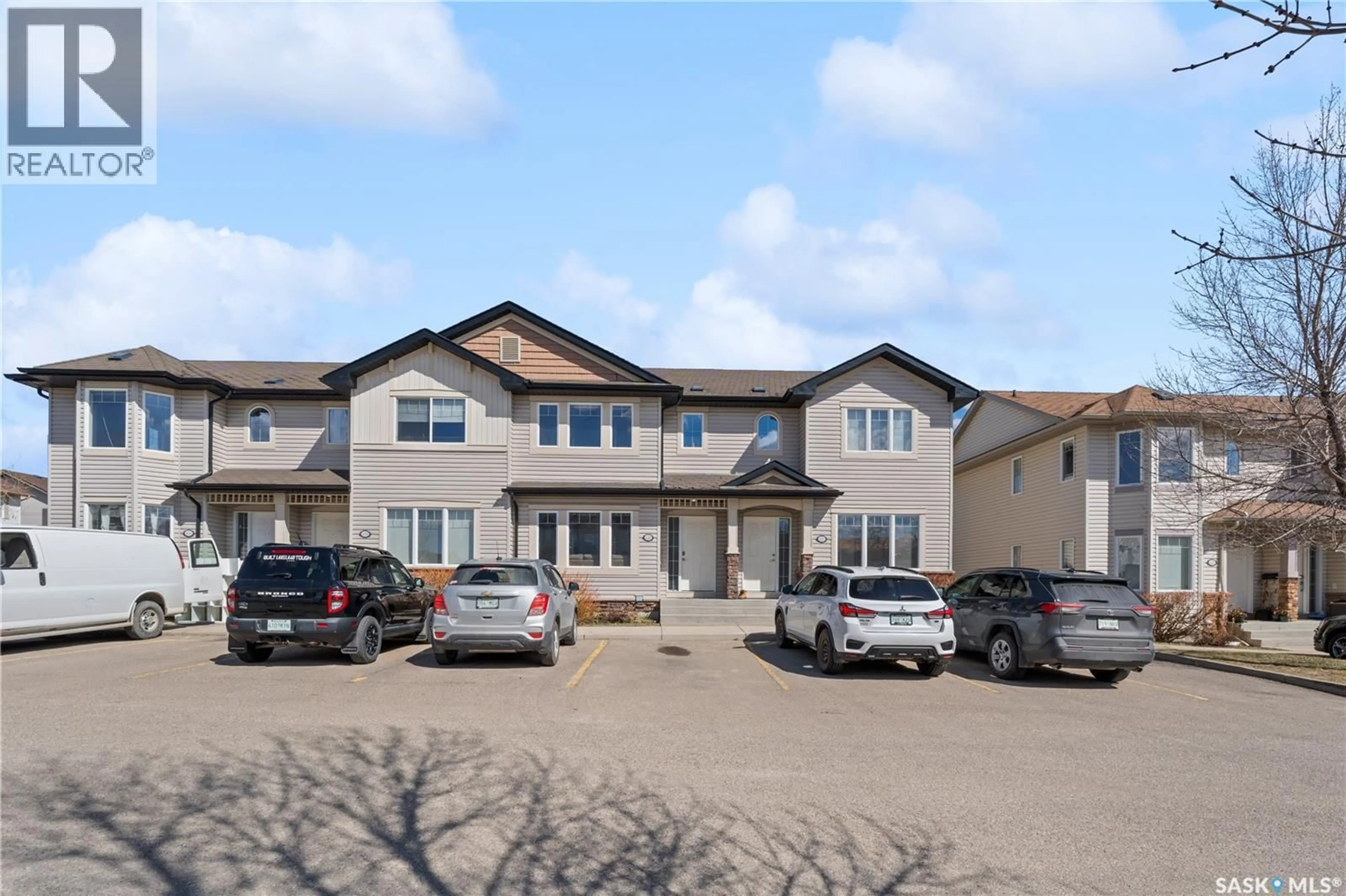 A pic from outside/outdoor area/front of a property/back of a property/a pic from drone, building for 303 - 420 SLIMMON PLACE, Saskatoon Saskatchewan S7V0A8