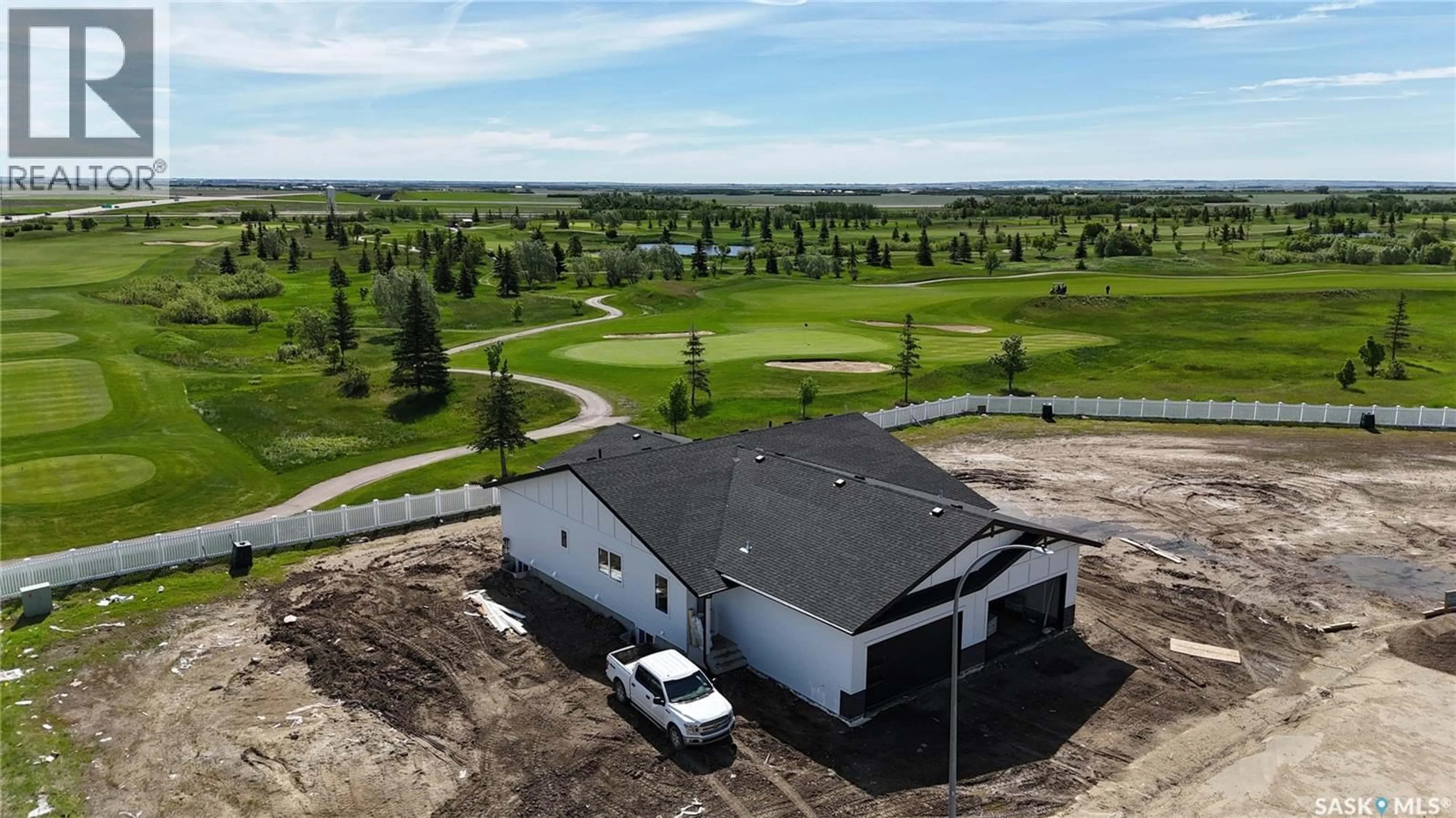 A pic from outside/outdoor area/front of a property/back of a property/a pic from drone, building for 858 DELAET BAY, Warman Saskatchewan S0K4S0