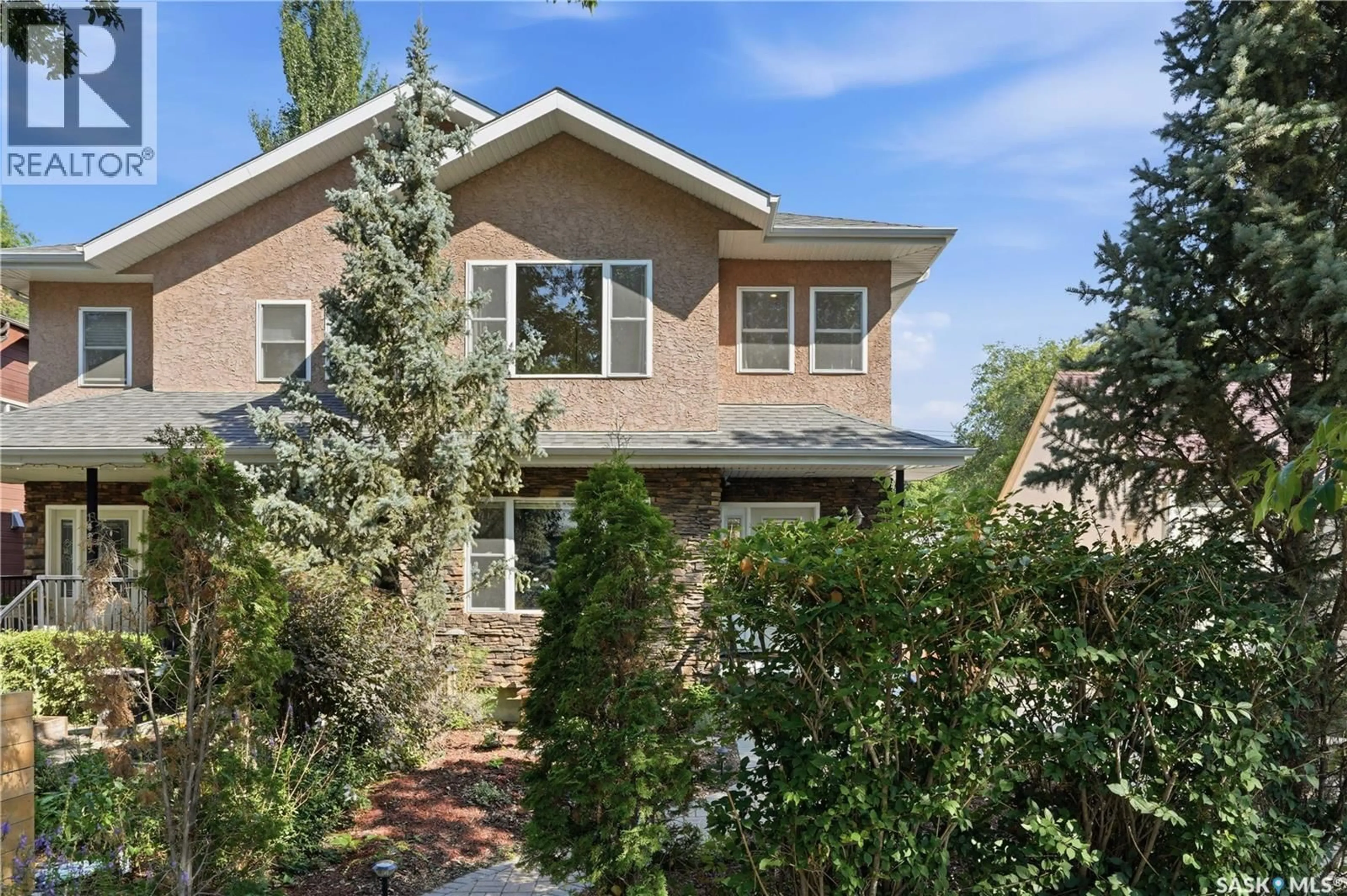 Home with brick exterior material, street for 1021 MAIN STREET, Saskatoon Saskatchewan S7H0K6