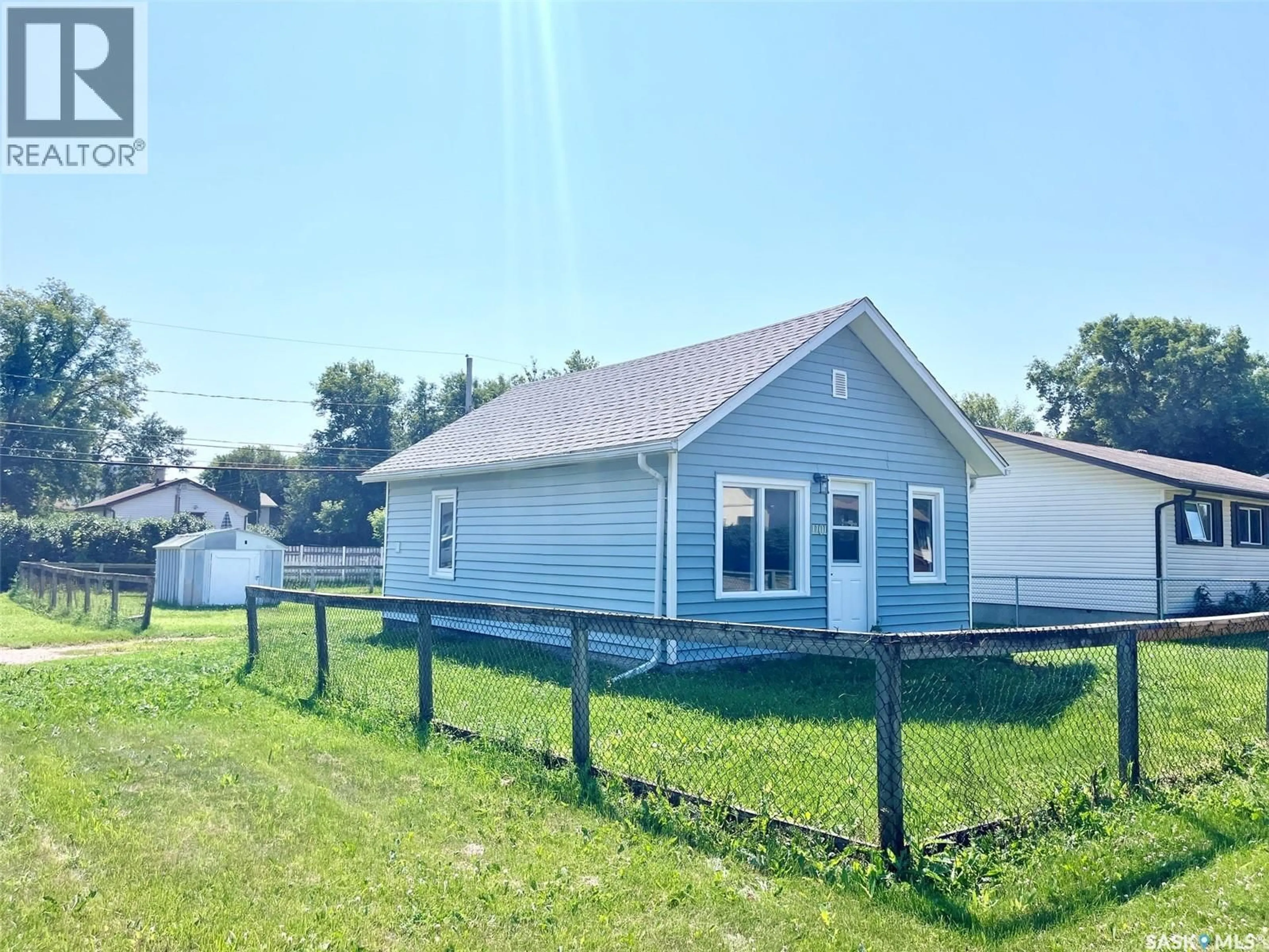 A pic from outside/outdoor area/front of a property/back of a property/a pic from drone, street for 1101 12TH STREET, Prince Albert Saskatchewan S6V3E3
