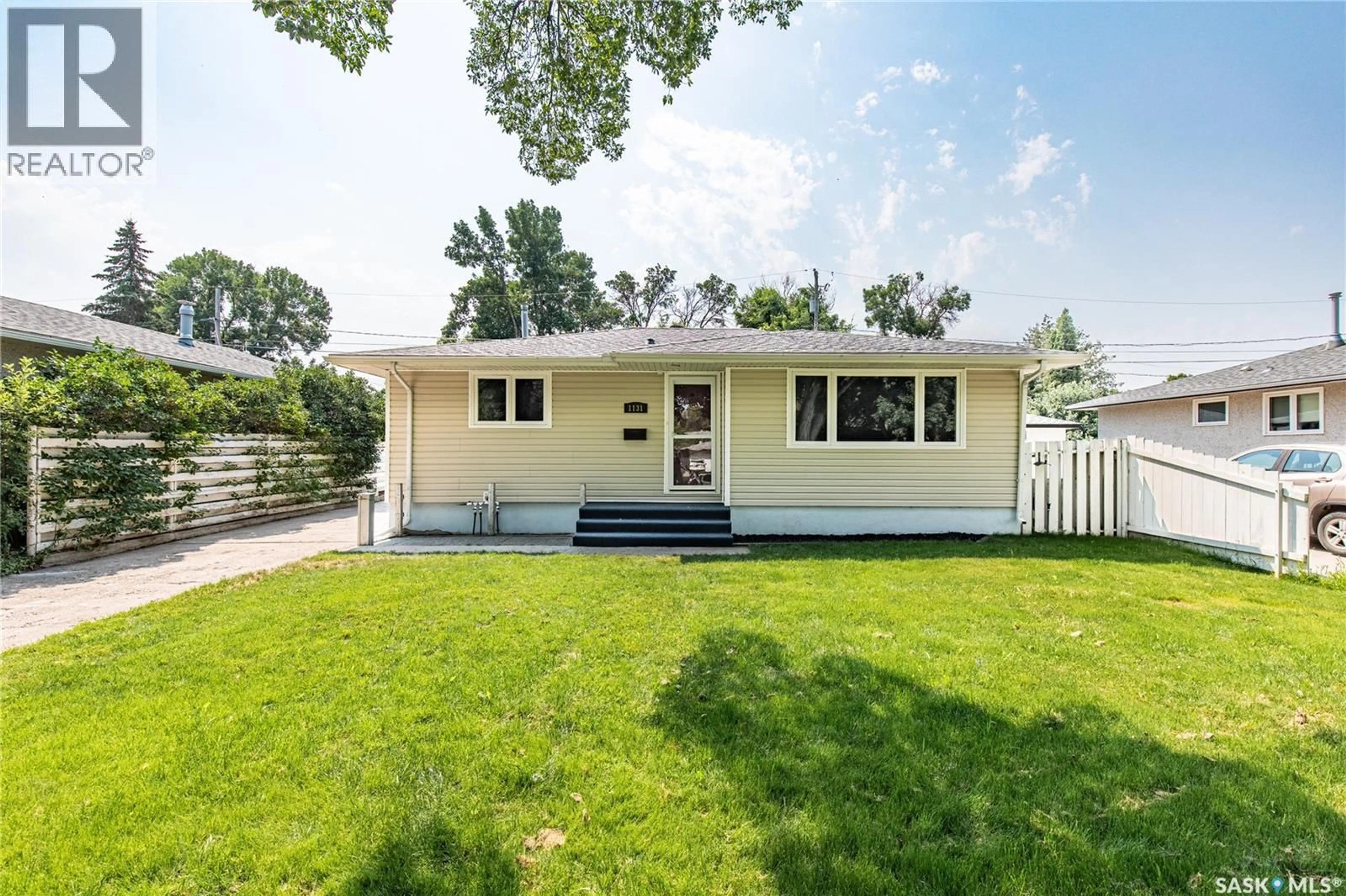 Home with vinyl exterior material, street for 1131 CURRIE CRESCENT, Moose Jaw Saskatchewan S6H5M7