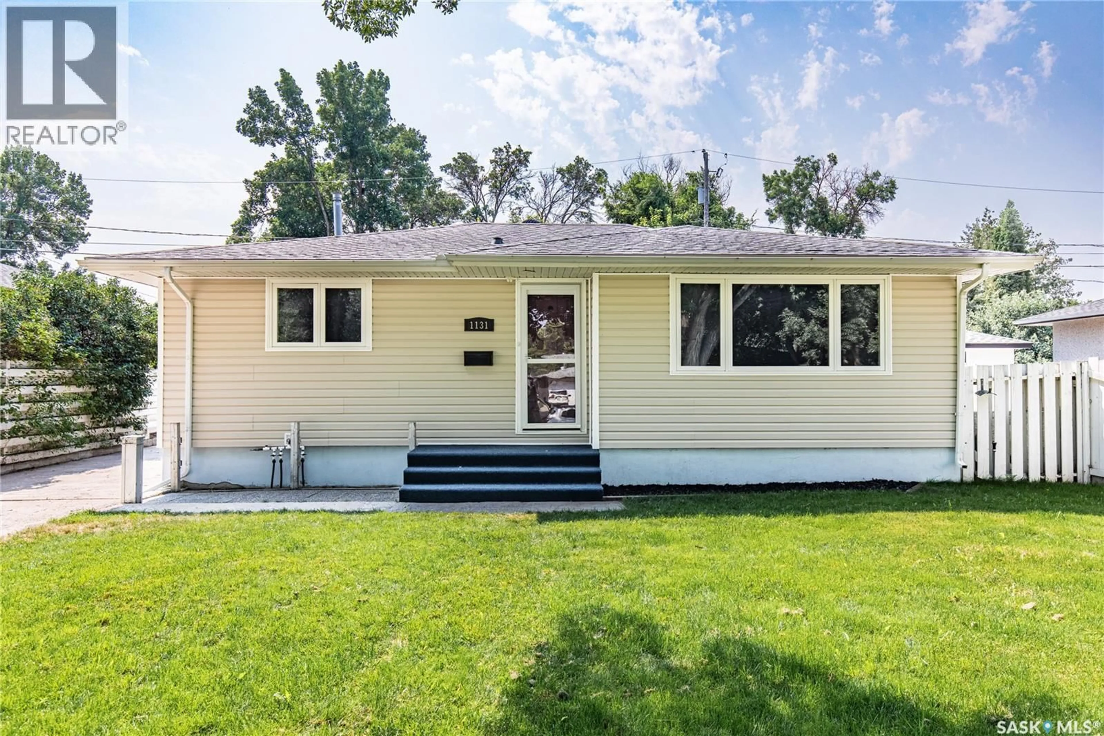 Home with vinyl exterior material, street for 1131 CURRIE CRESCENT, Moose Jaw Saskatchewan S6H5M7