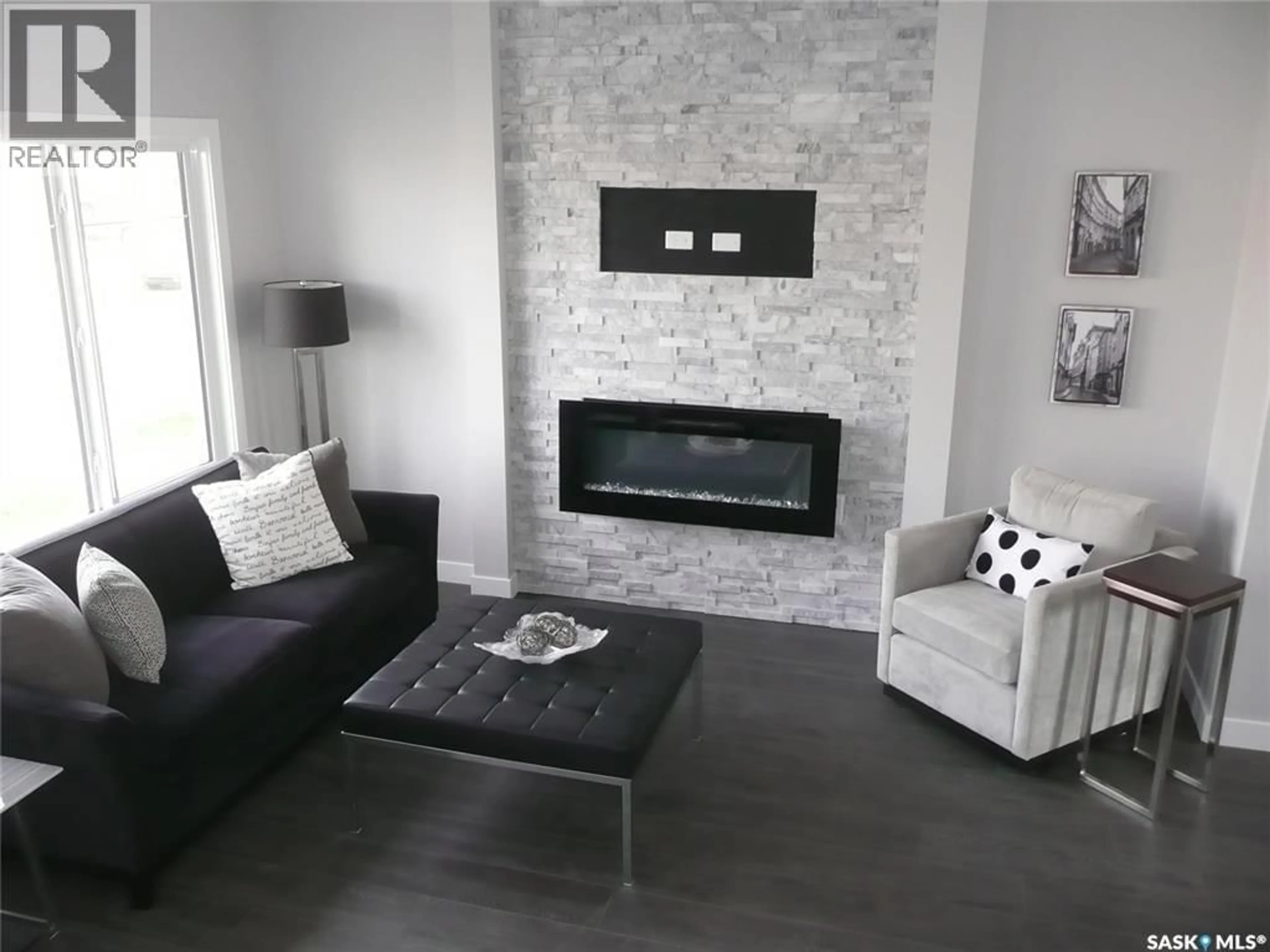 Living room with furniture, ceramic/tile floor for 2972 GREEN TURTLE ROAD, Regina Saskatchewan S4V4G4