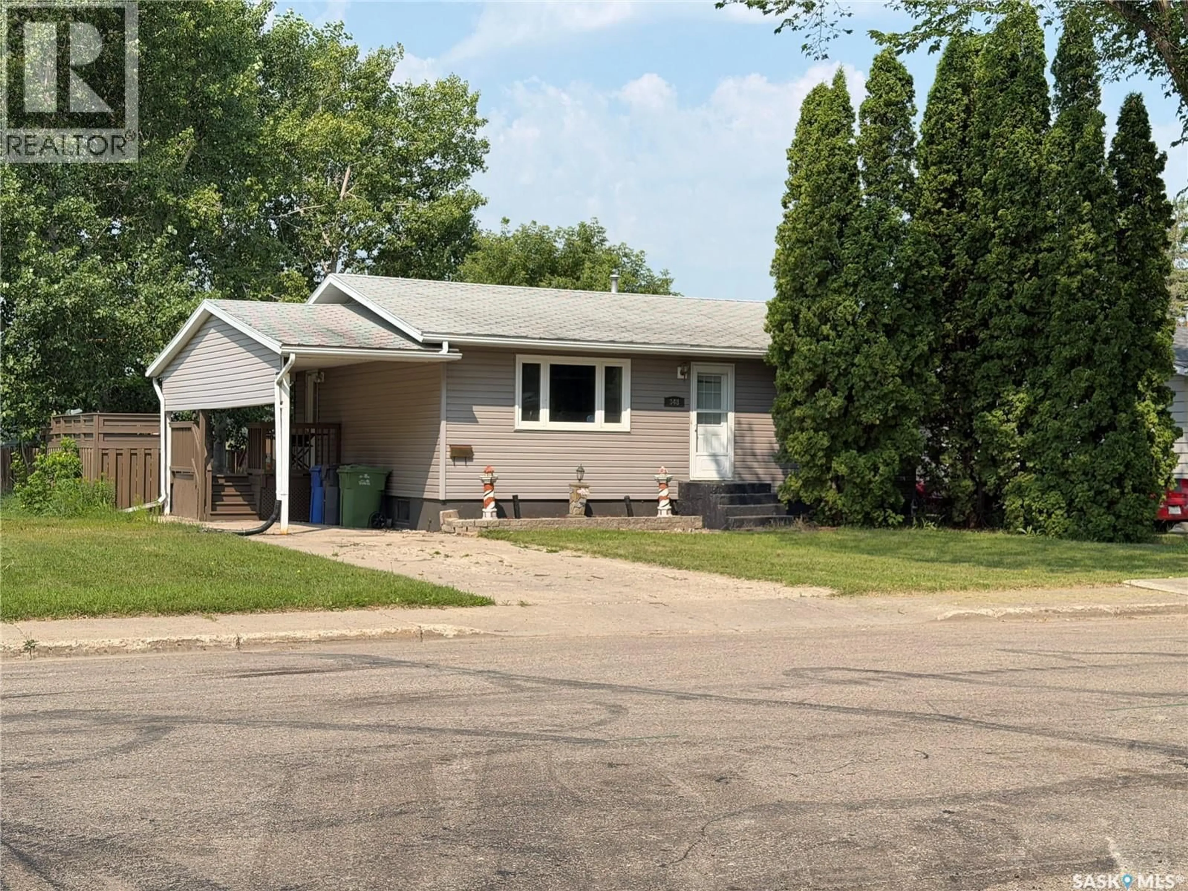 Home with vinyl exterior material, street for 348 MYRTLE AVENUE, Yorkton Saskatchewan S3N1T6