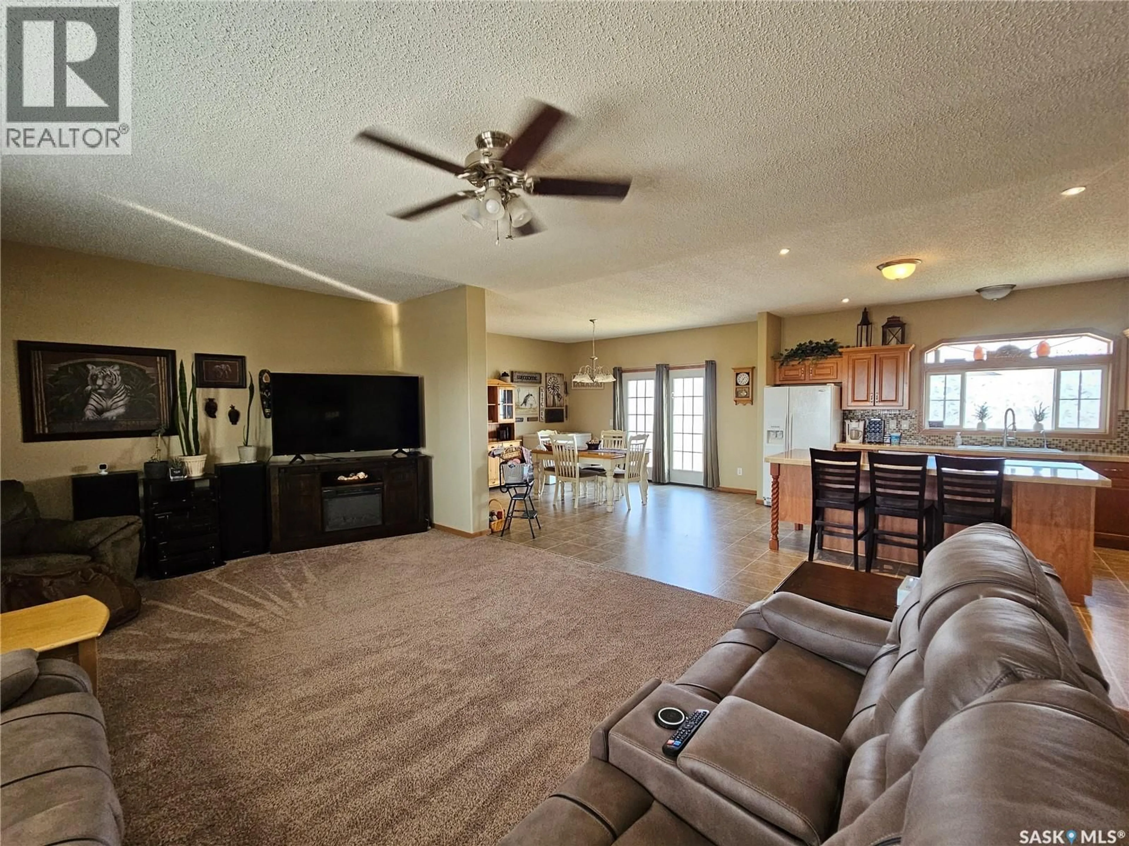 Living room with furniture, unknown for 165 PRAIRIE SUN COURT, Swift Current Saskatchewan S9H3X6
