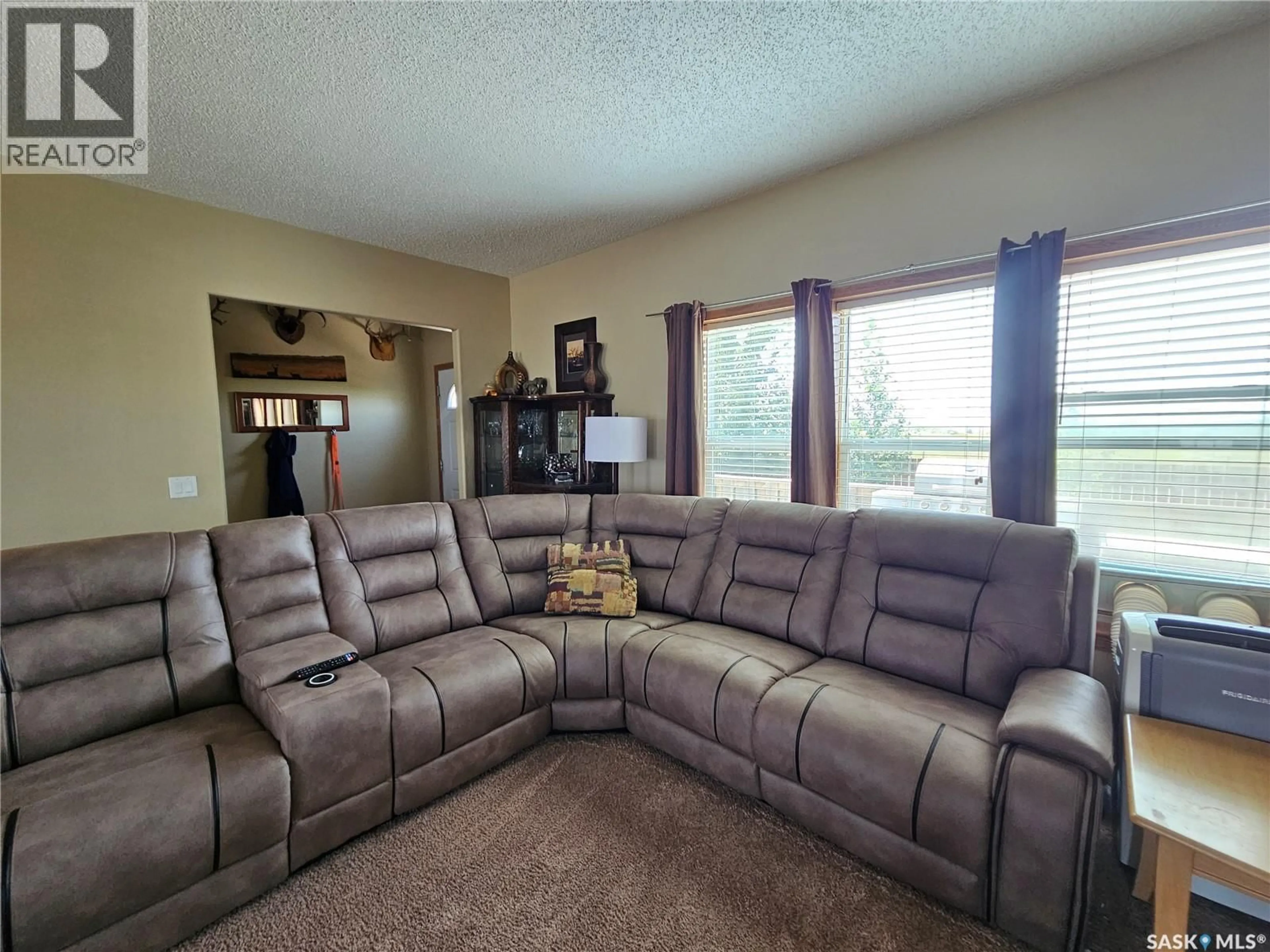 Living room with furniture, unknown for 165 PRAIRIE SUN COURT, Swift Current Saskatchewan S9H3X6