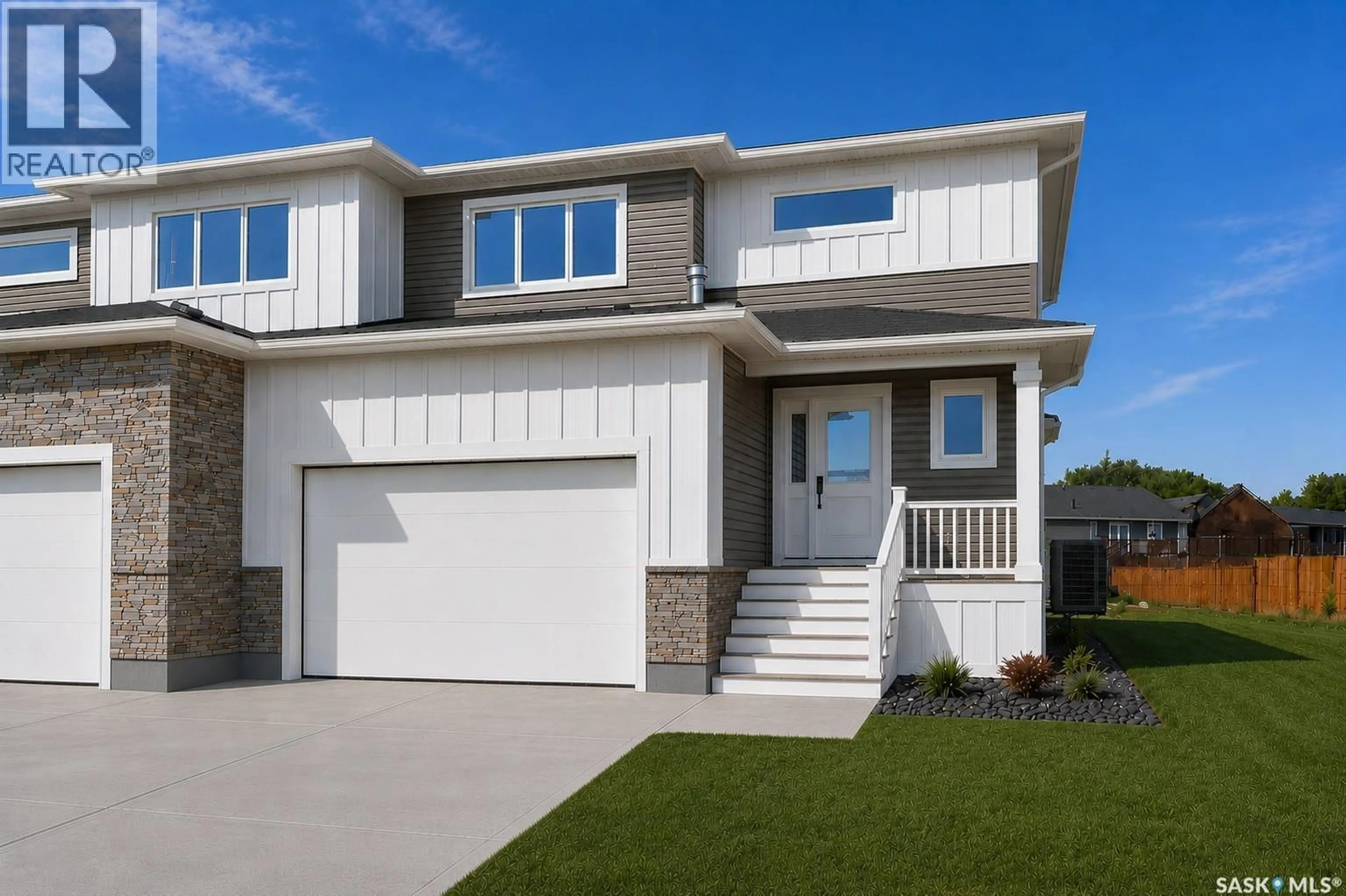 Home with vinyl exterior material, street for 224 FROESE CRESCENT, Warman Saskatchewan S0K4S0