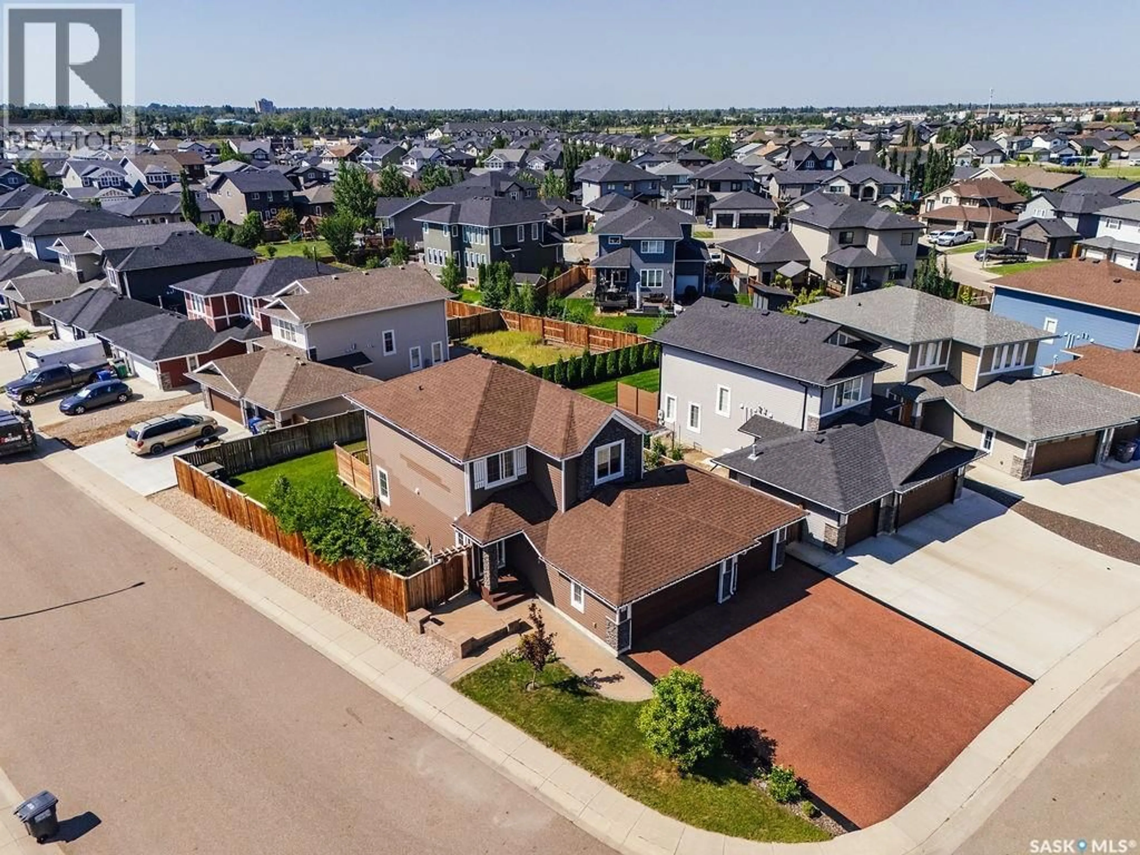 A pic from outside/outdoor area/front of a property/back of a property/a pic from drone, street for 603 PICHLER CRESCENT, Saskatoon Saskatchewan S7V0G2