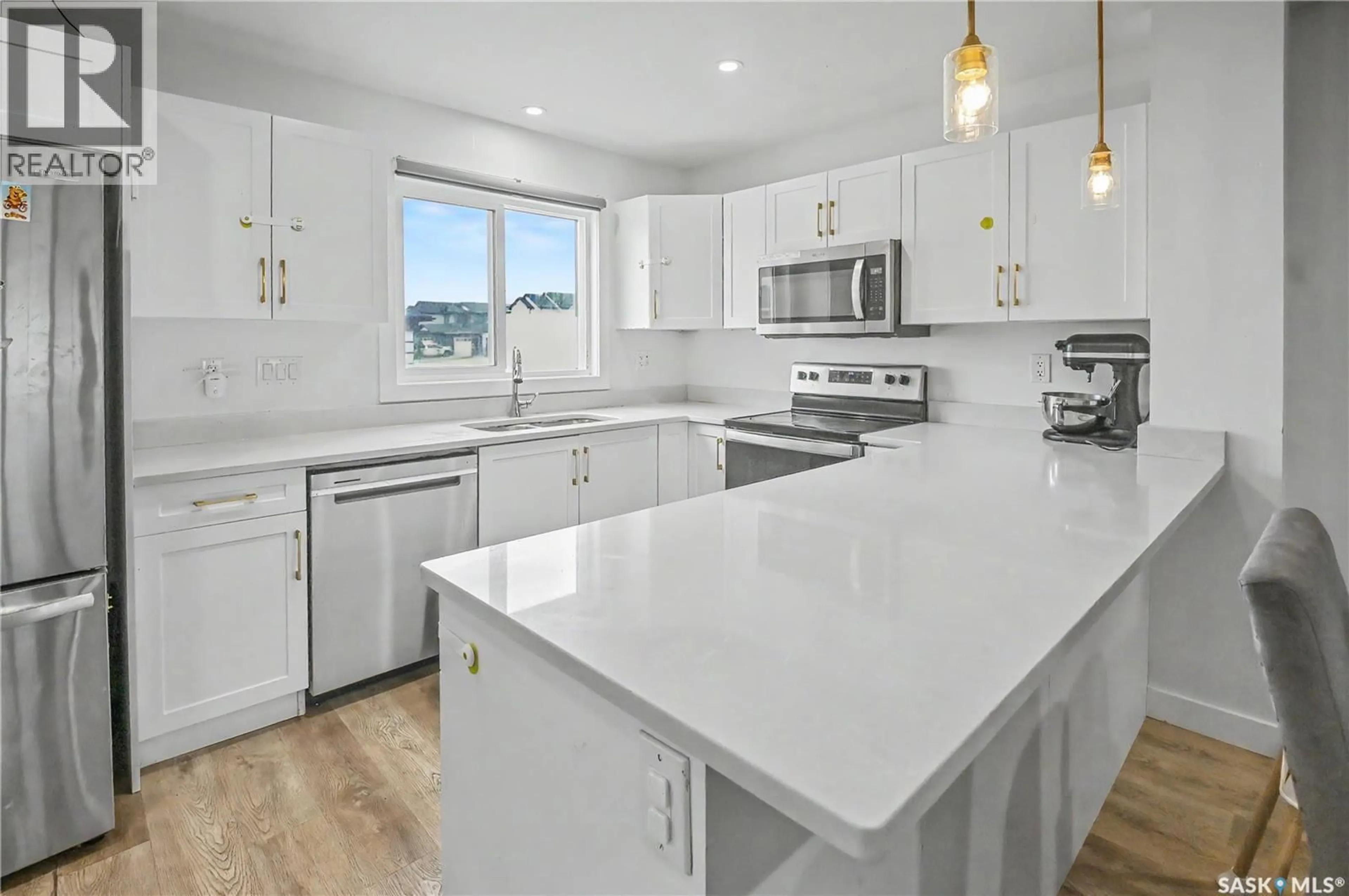 Open concept kitchen, ceramic/tile floor for 106 WESTFIELD ROAD, Saskatoon Saskatchewan S7V0Z8