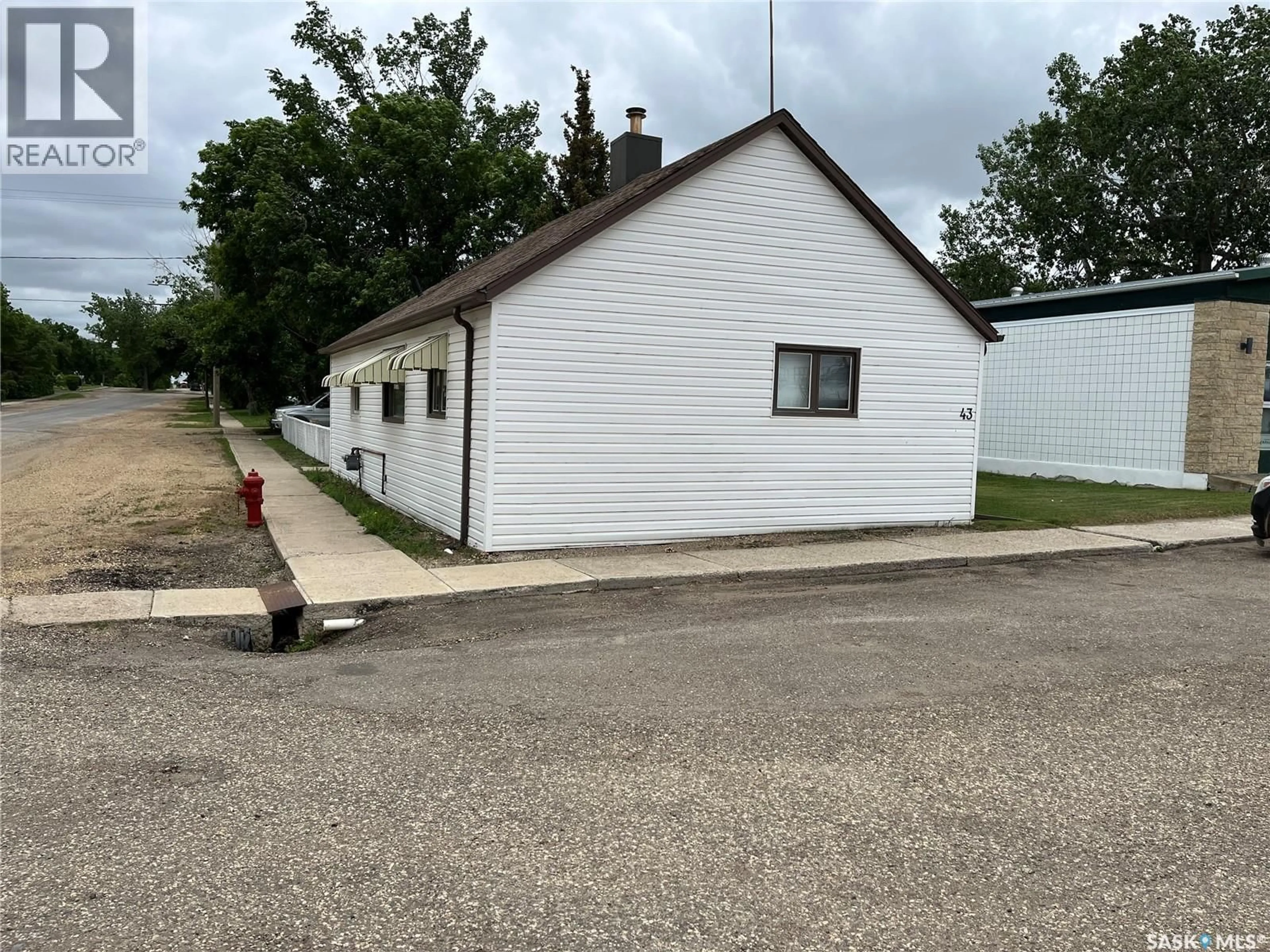 A pic from outside/outdoor area/front of a property/back of a property/a pic from drone, building for 43 2ND AVENUE, Lafleche Saskatchewan S0H2K0