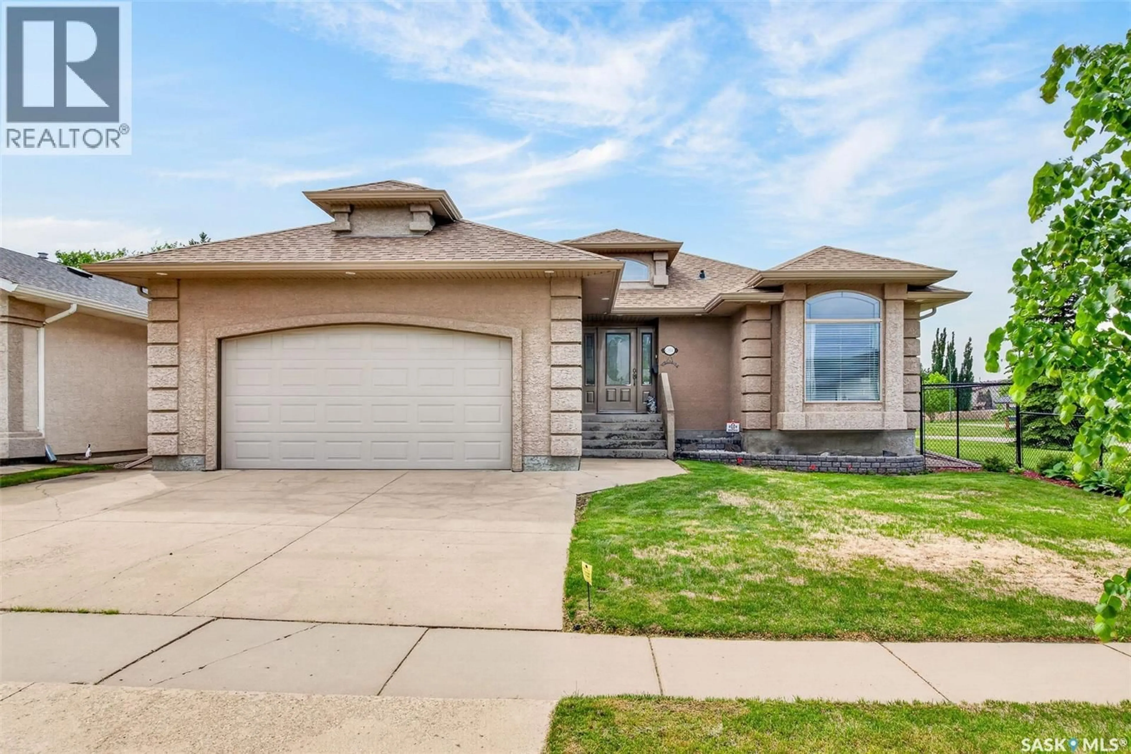 Home with brick exterior material, street for 1 TELFER BAY, Prince Albert Saskatchewan S6X1C4