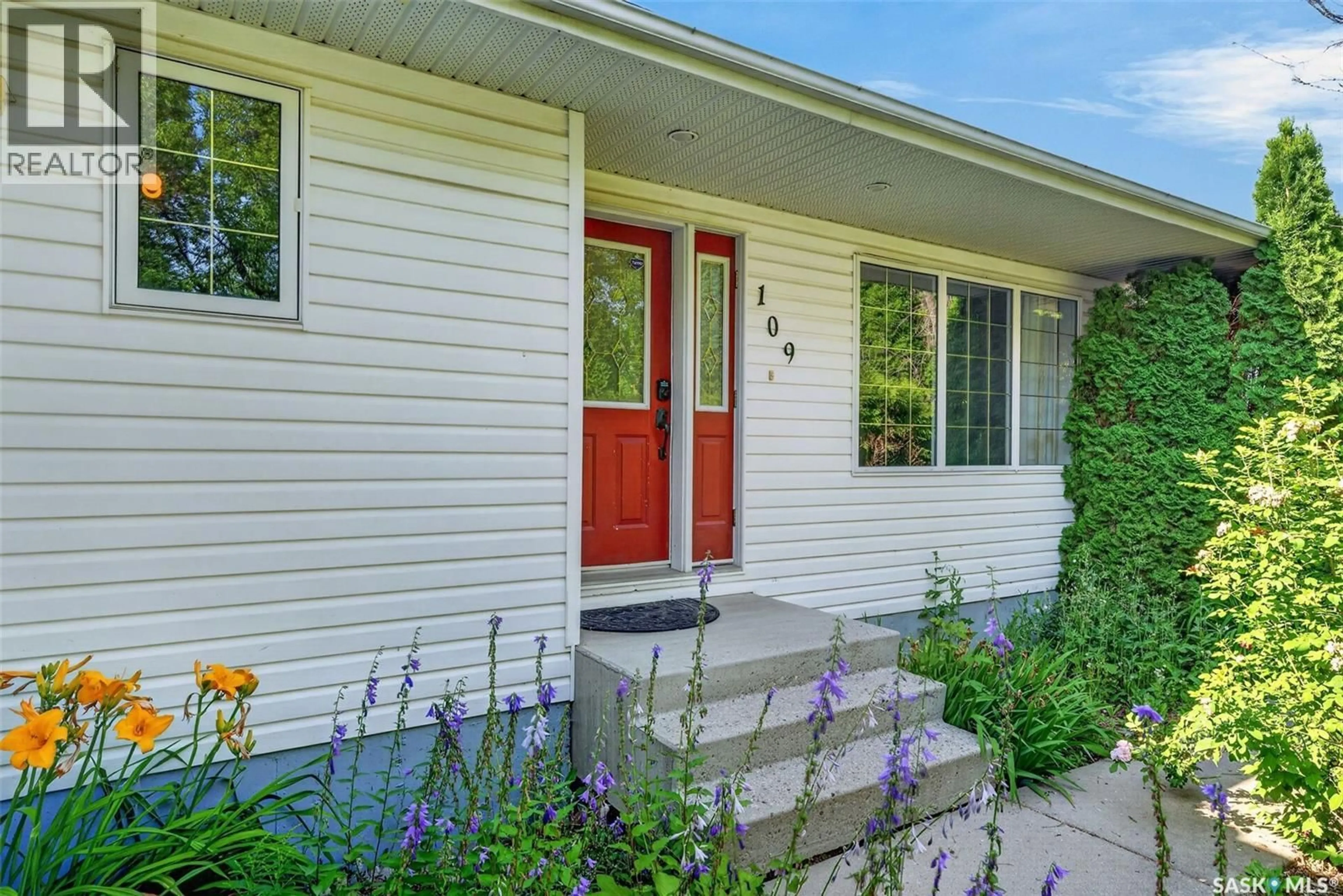 Home with vinyl exterior material, street for 109 1ST AVENUE, Vanscoy Saskatchewan S0L3J0