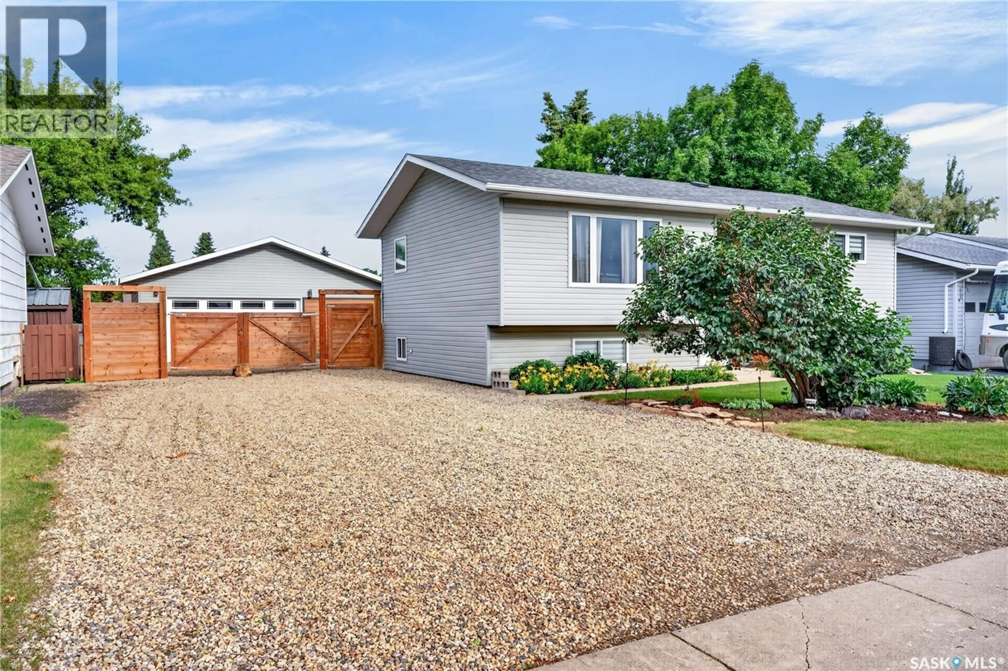 Home with vinyl exterior material, street for 315 CASKEY DRIVE, Melfort Saskatchewan S0E1A0