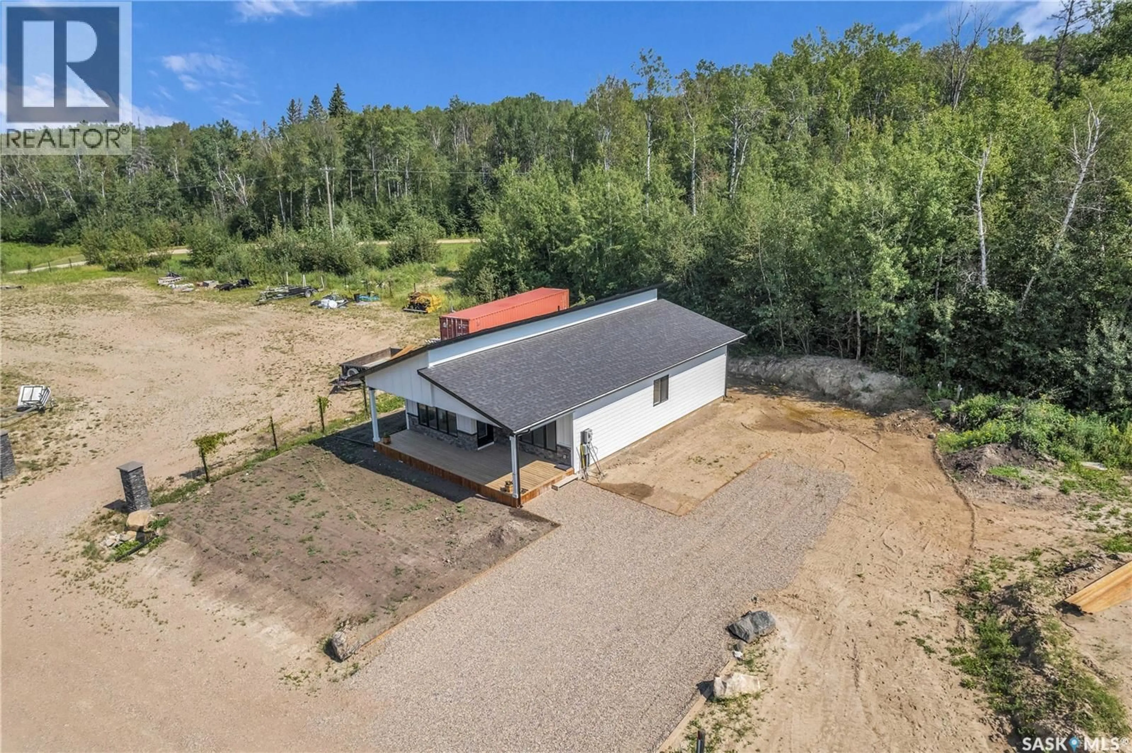 A pic from outside/outdoor area/front of a property/back of a property/a pic from drone, building for 101 - 23 NEIS ACCESS ROAD, Emma Lake Saskatchewan S0J0N0