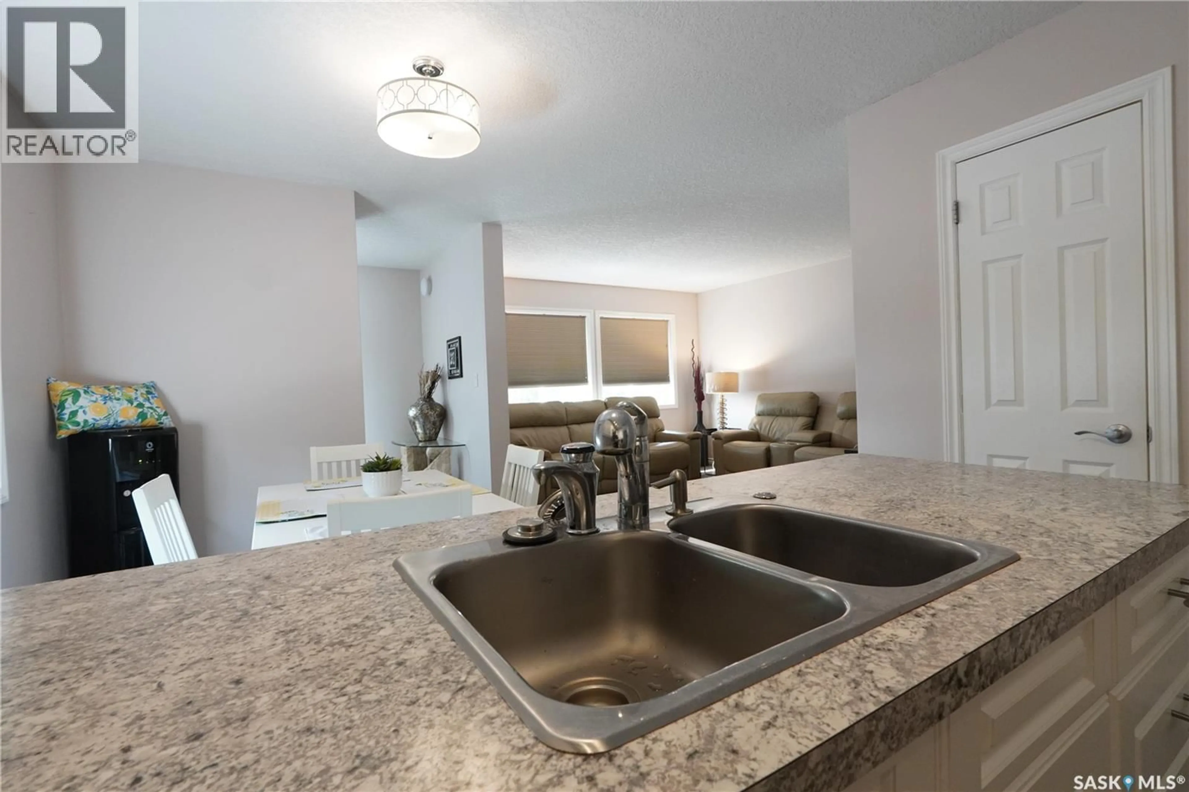 Open concept kitchen, ceramic/tile floor for 5602 DEWDNEY AVENUE, Regina Saskatchewan S4T1C7
