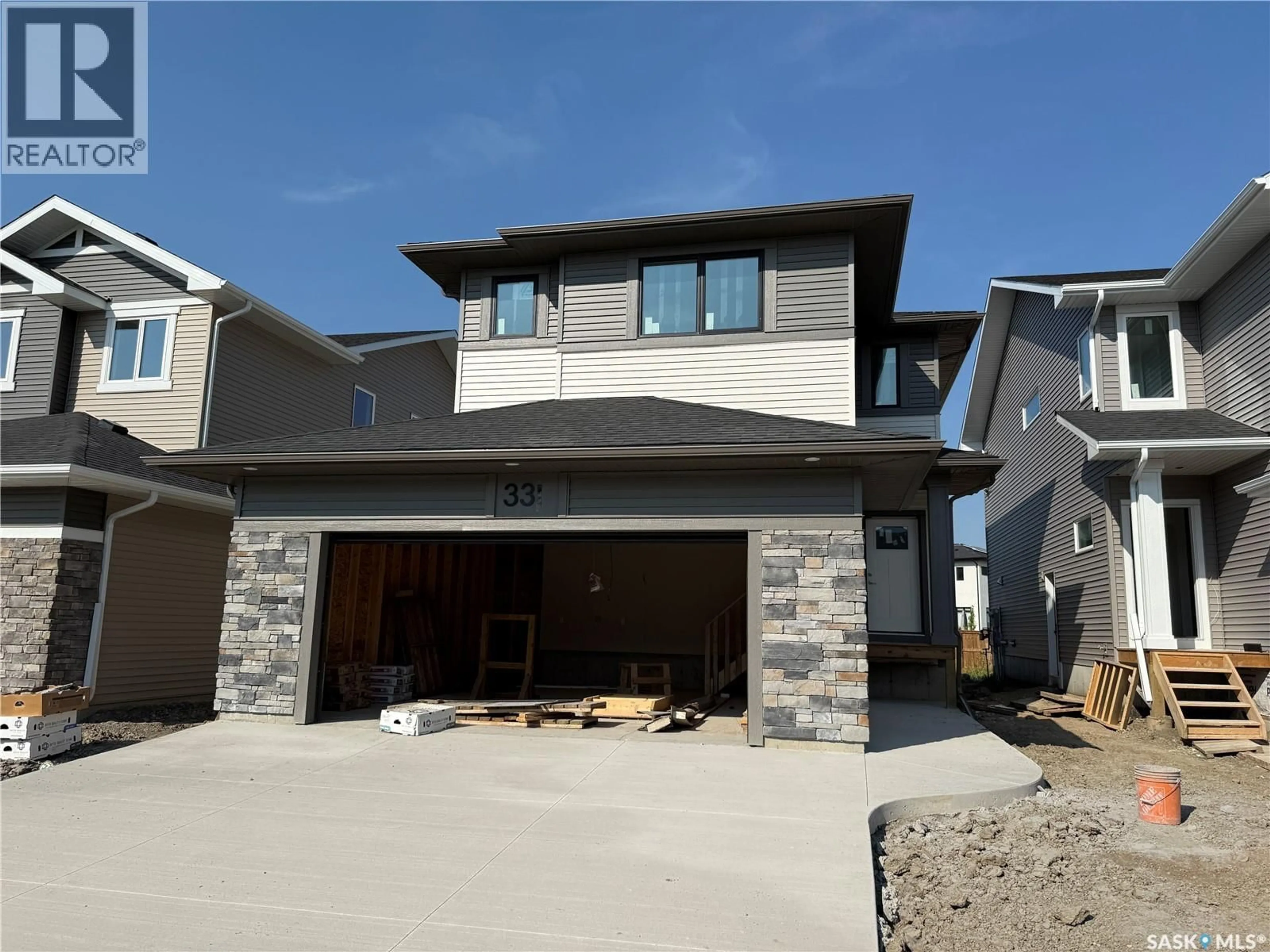 Home with brick exterior material, street for 331 COWESSESS ROAD, Saskatoon Saskatchewan S7V1Y4