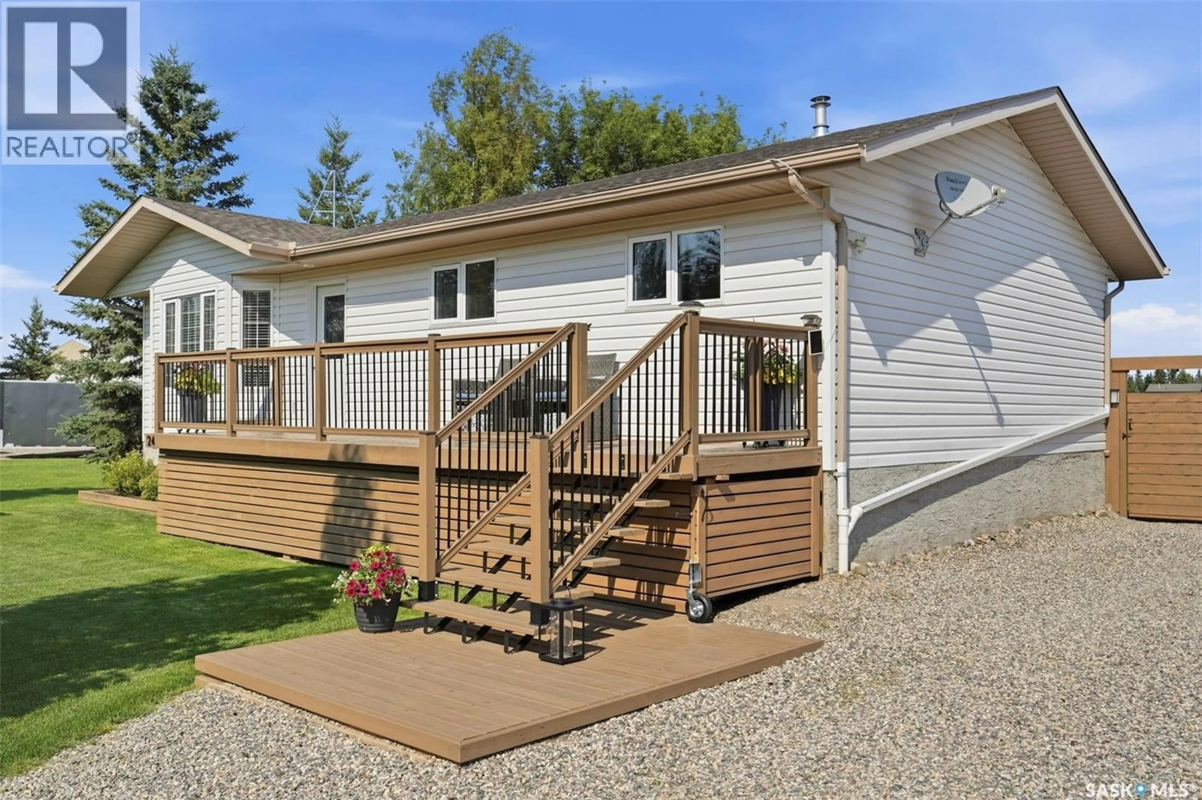 Home with vinyl exterior material, street for 24 AIRPORT DRIVE, Candle Lake Saskatchewan S0J3E0