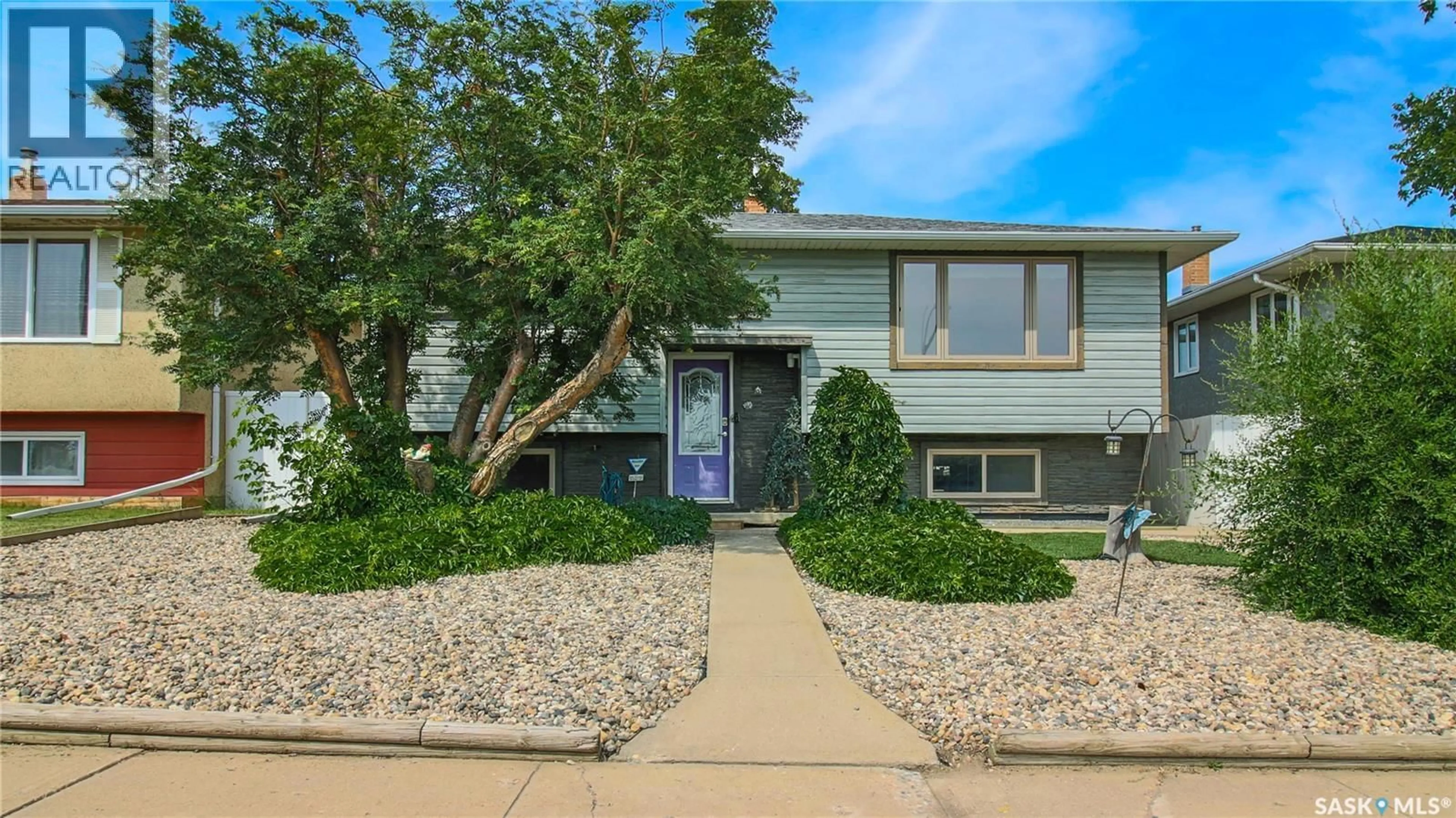 Home with vinyl exterior material, street for 6524 DEWDNEY AVENUE, Regina Saskatchewan S4T1E5