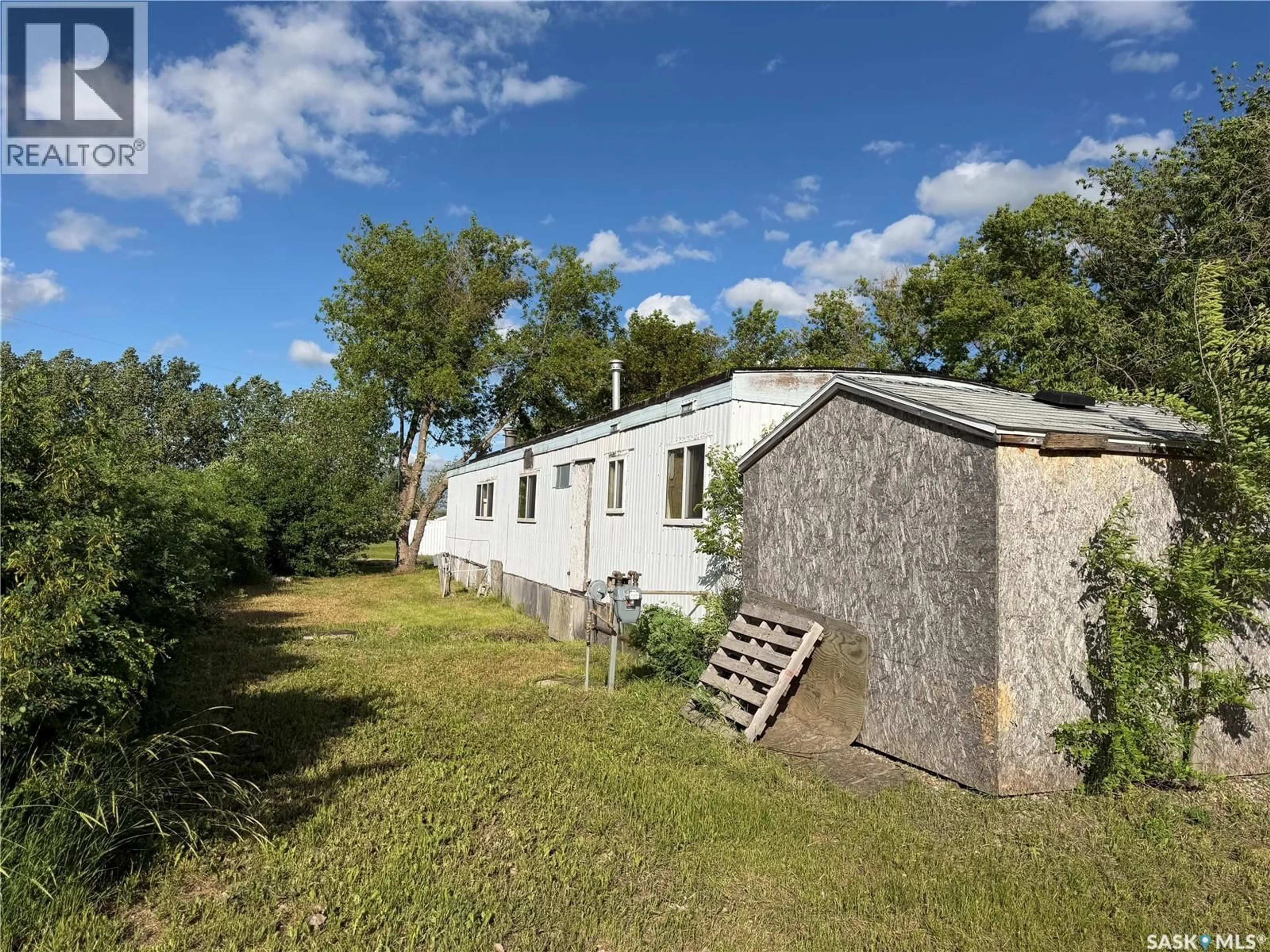 A pic from outside/outdoor area/front of a property/back of a property/a pic from drone, unknown for 2 PRAIRIE SUN COURT, Swift Current Saskatchewan S9H3X6