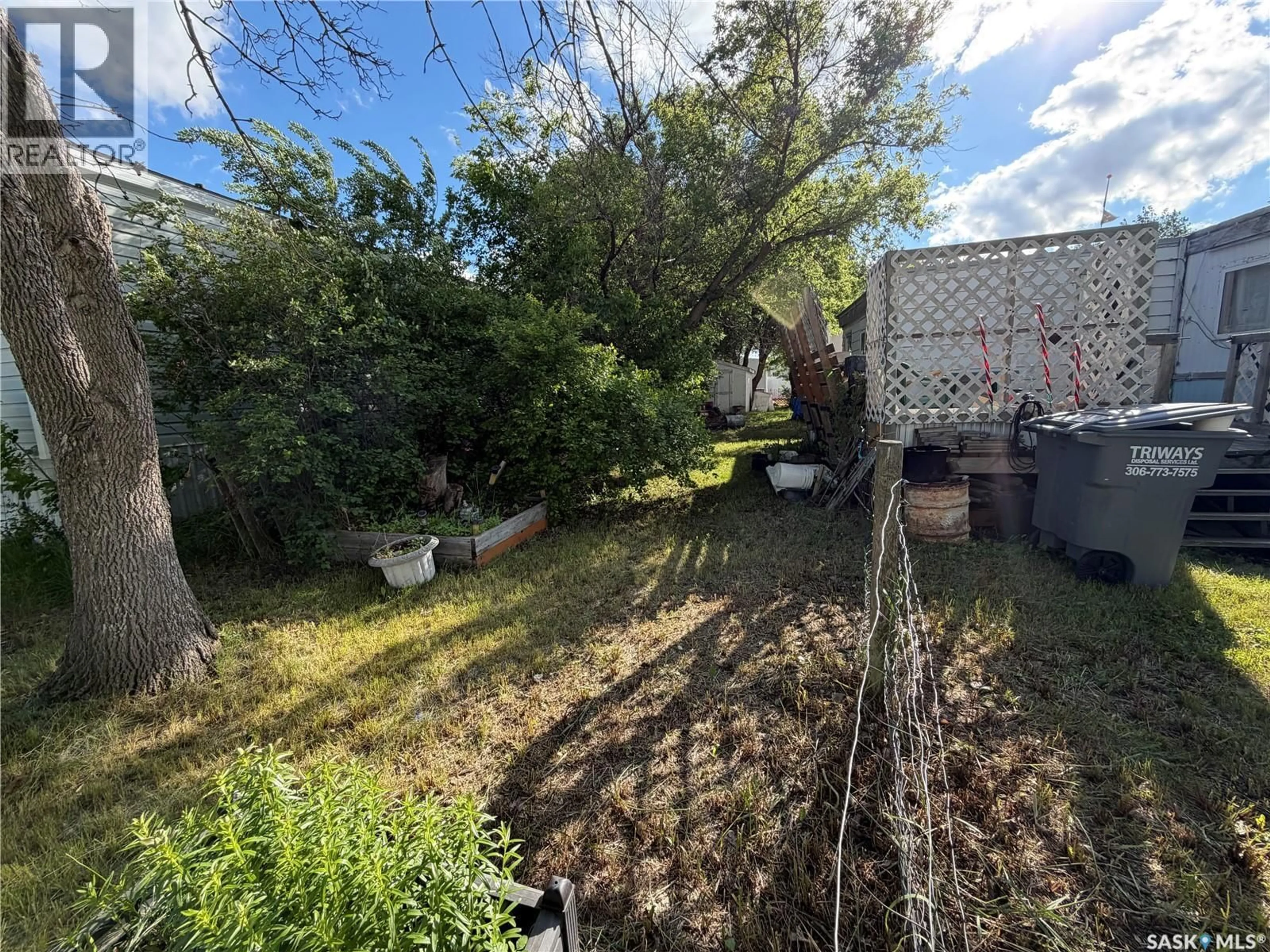 A pic from outside/outdoor area/front of a property/back of a property/a pic from drone, forest/trees view for 2 PRAIRIE SUN COURT, Swift Current Saskatchewan S9H3X6