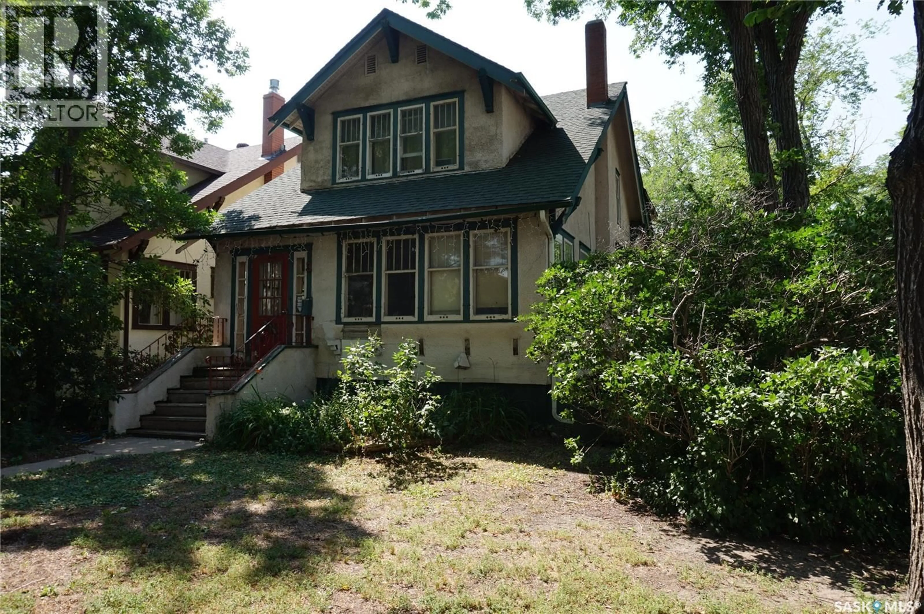 Home with vinyl exterior material, street for 3 ANGUS CRESCENT, Regina Saskatchewan S4T6N1