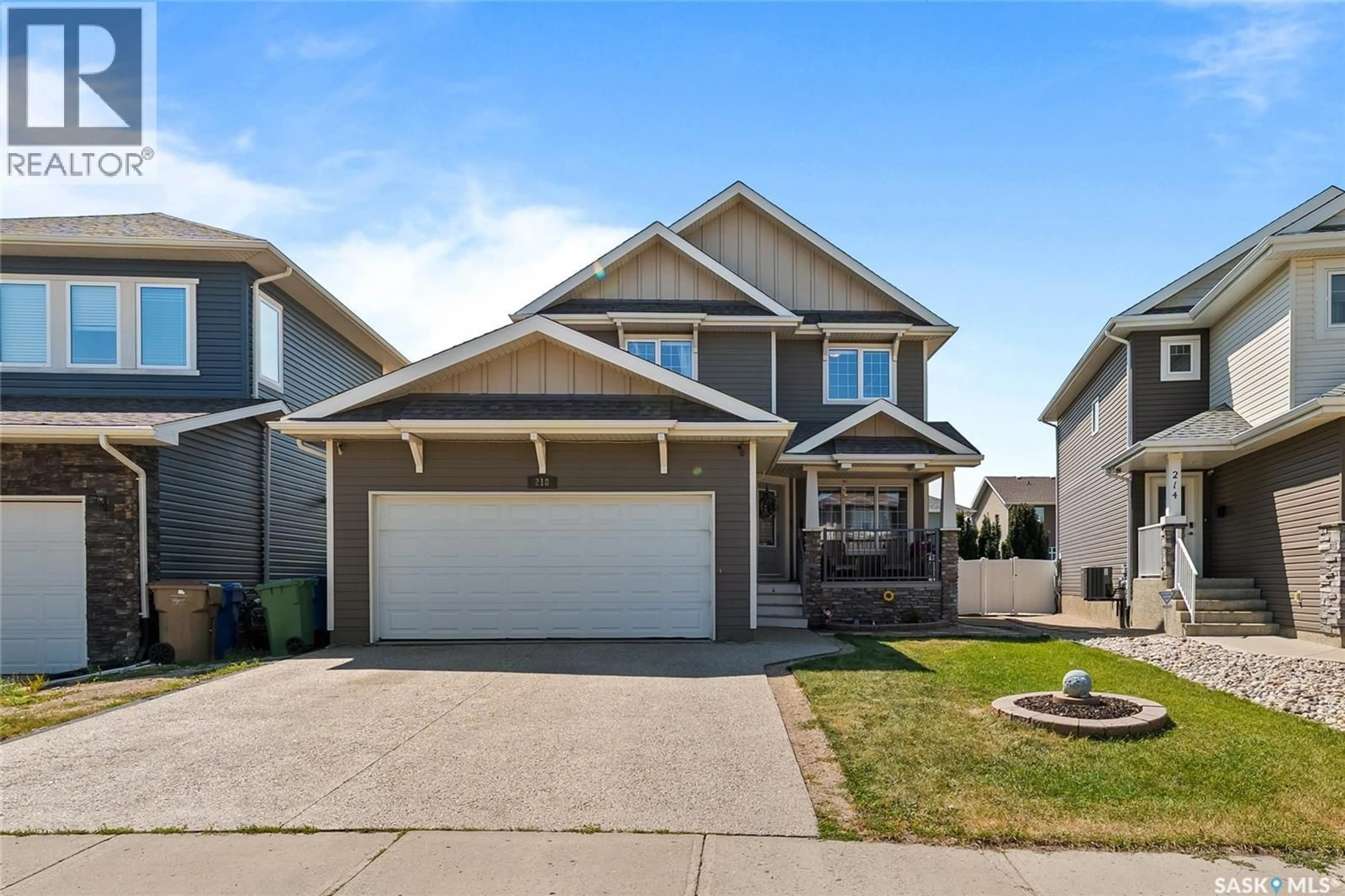 Home with vinyl exterior material, street for 218 BROOKVIEW DRIVE, Regina Saskatchewan S4Y0B2