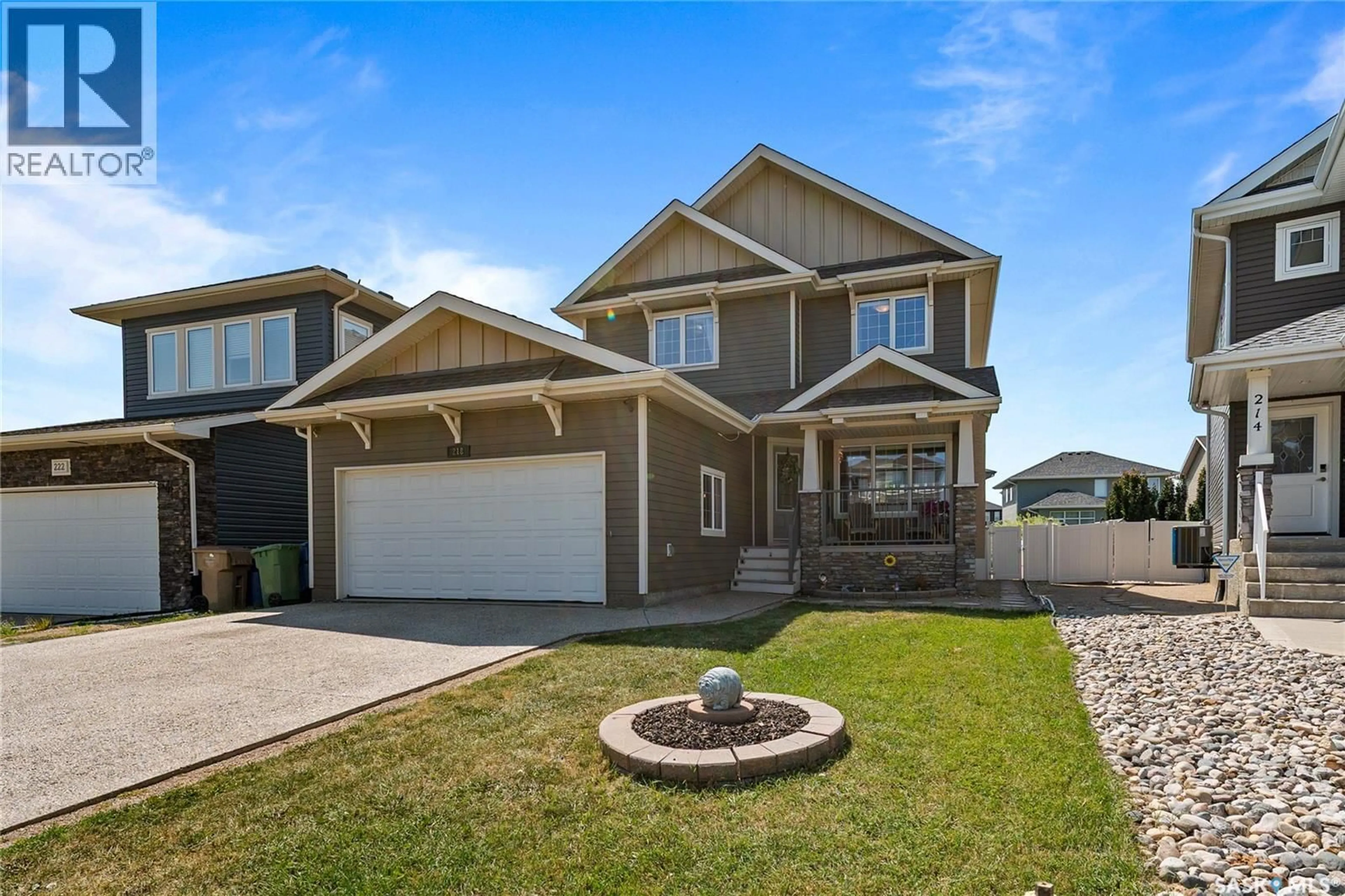 Home with vinyl exterior material, street for 218 BROOKVIEW DRIVE, Regina Saskatchewan S4Y0B2
