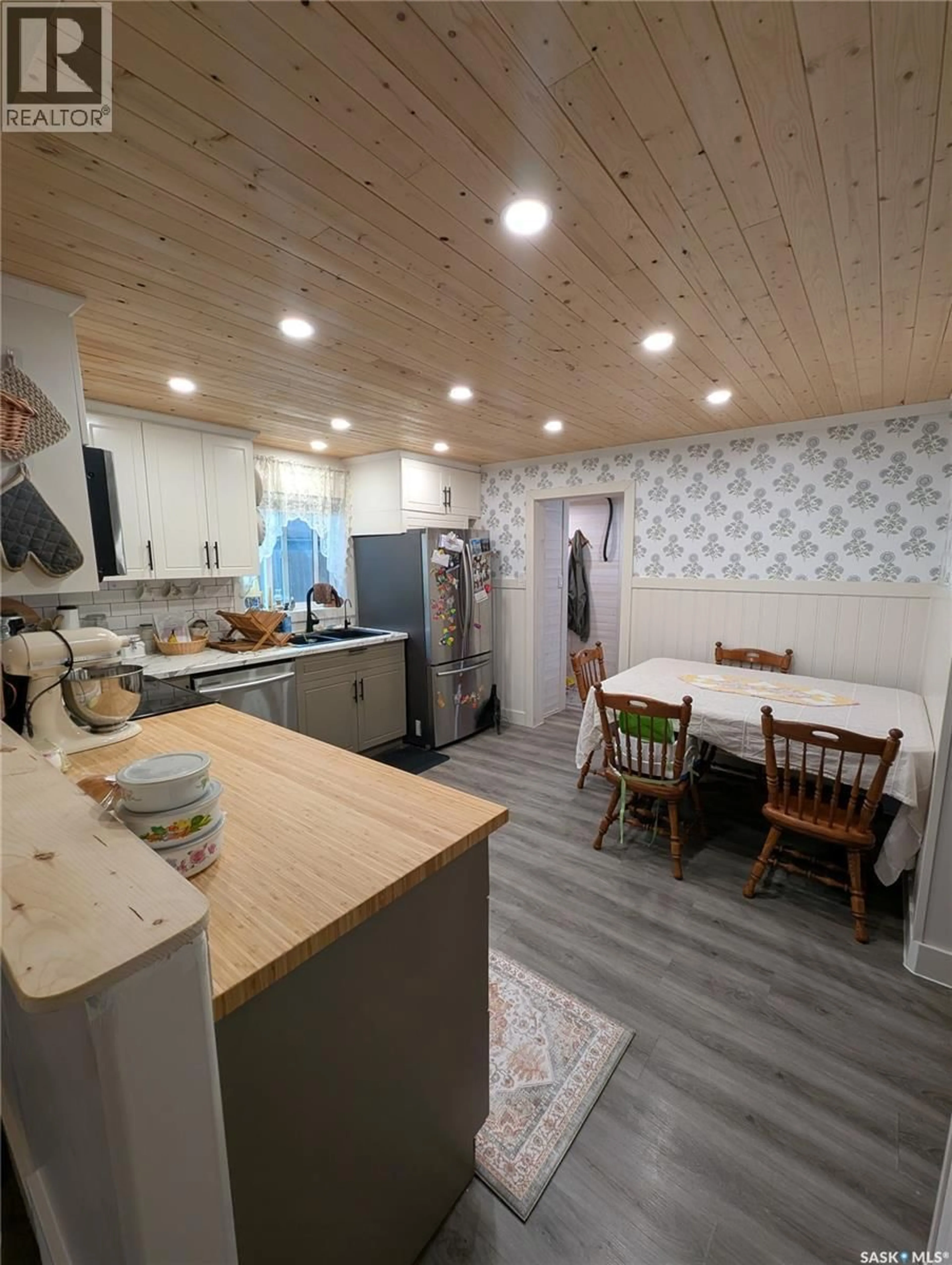 Open concept kitchen, wood/laminate floor for 2009 7TH STREET, Rosthern Saskatchewan S0K3R0