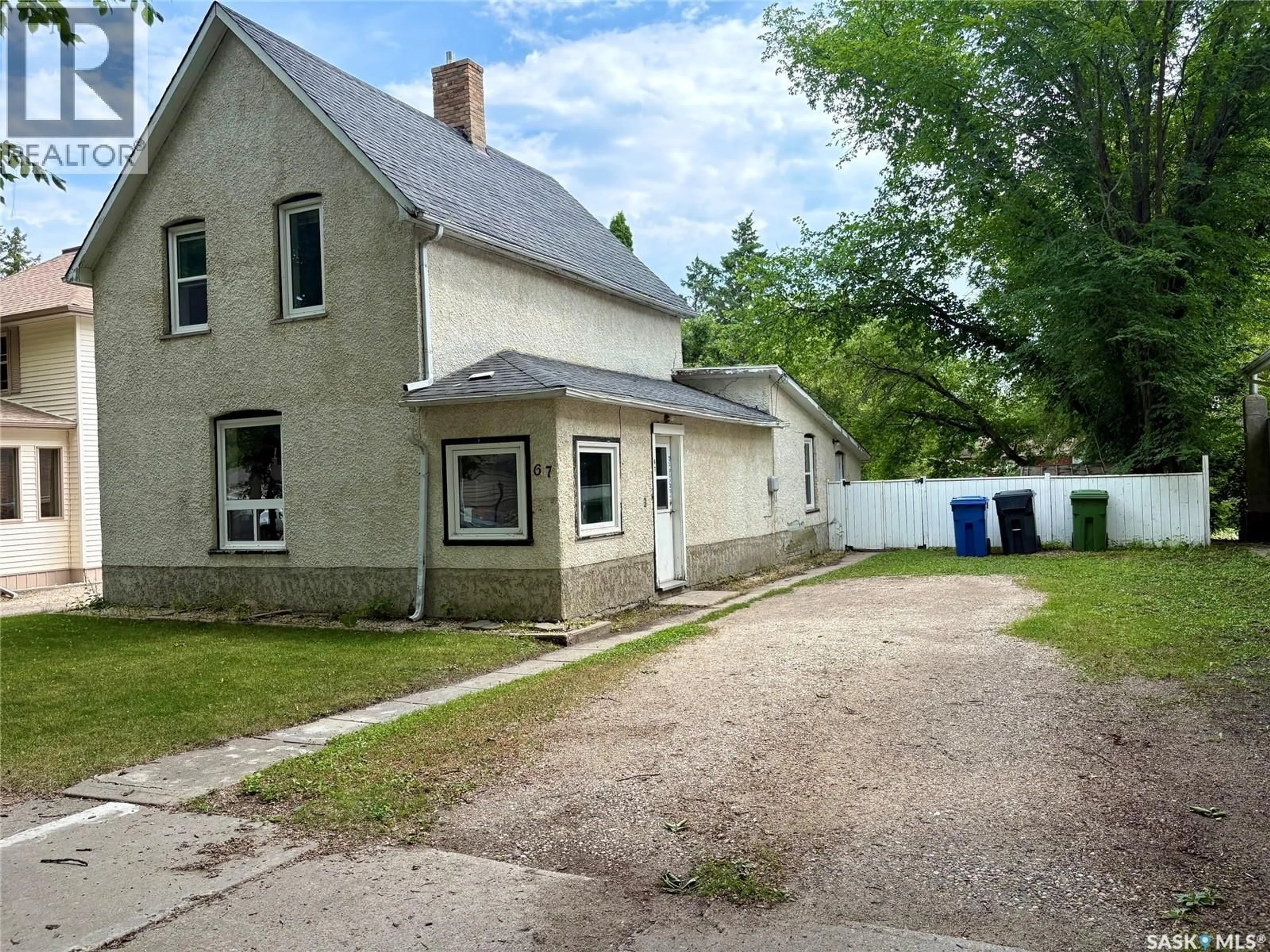A pic from outside/outdoor area/front of a property/back of a property/a pic from drone, street for 67 ASSINIBOIA AVENUE, Yorkton Saskatchewan S3N1N7