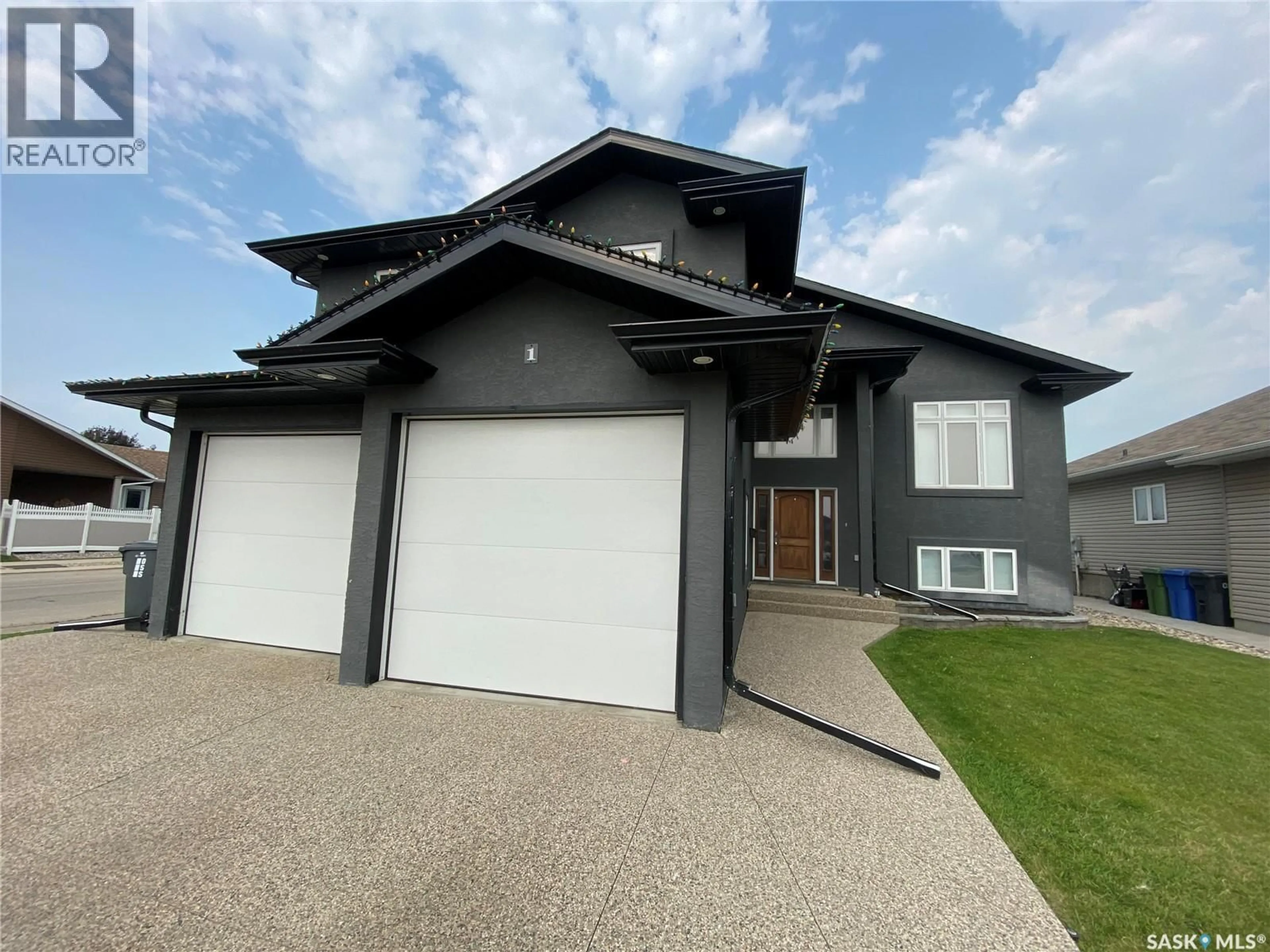 Home with vinyl exterior material, street for 1 PARTRIDGE COURT, Yorkton Saskatchewan S3N3J8