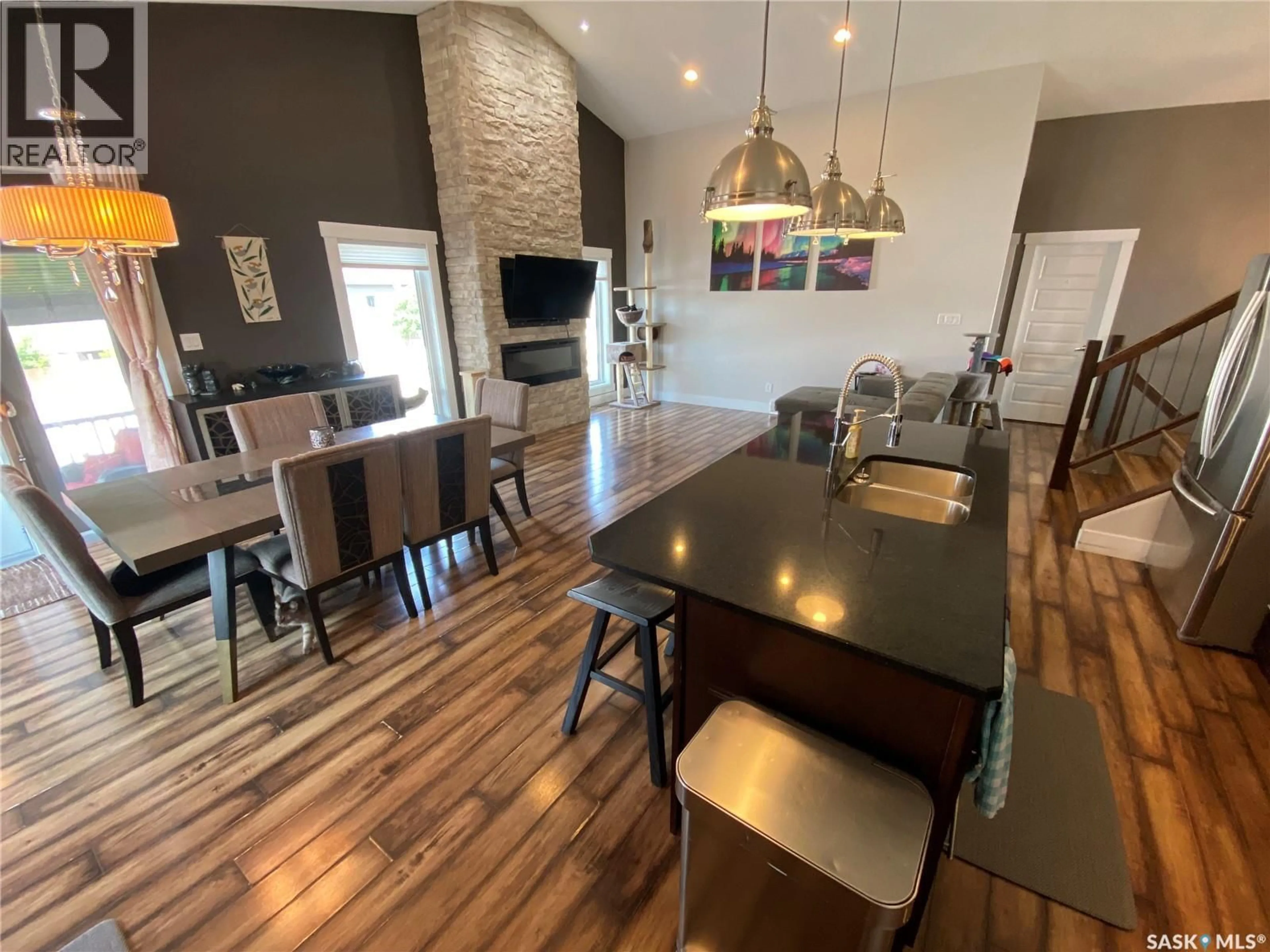 Open concept kitchen, wood/laminate floor for 1 PARTRIDGE COURT, Yorkton Saskatchewan S3N3J8