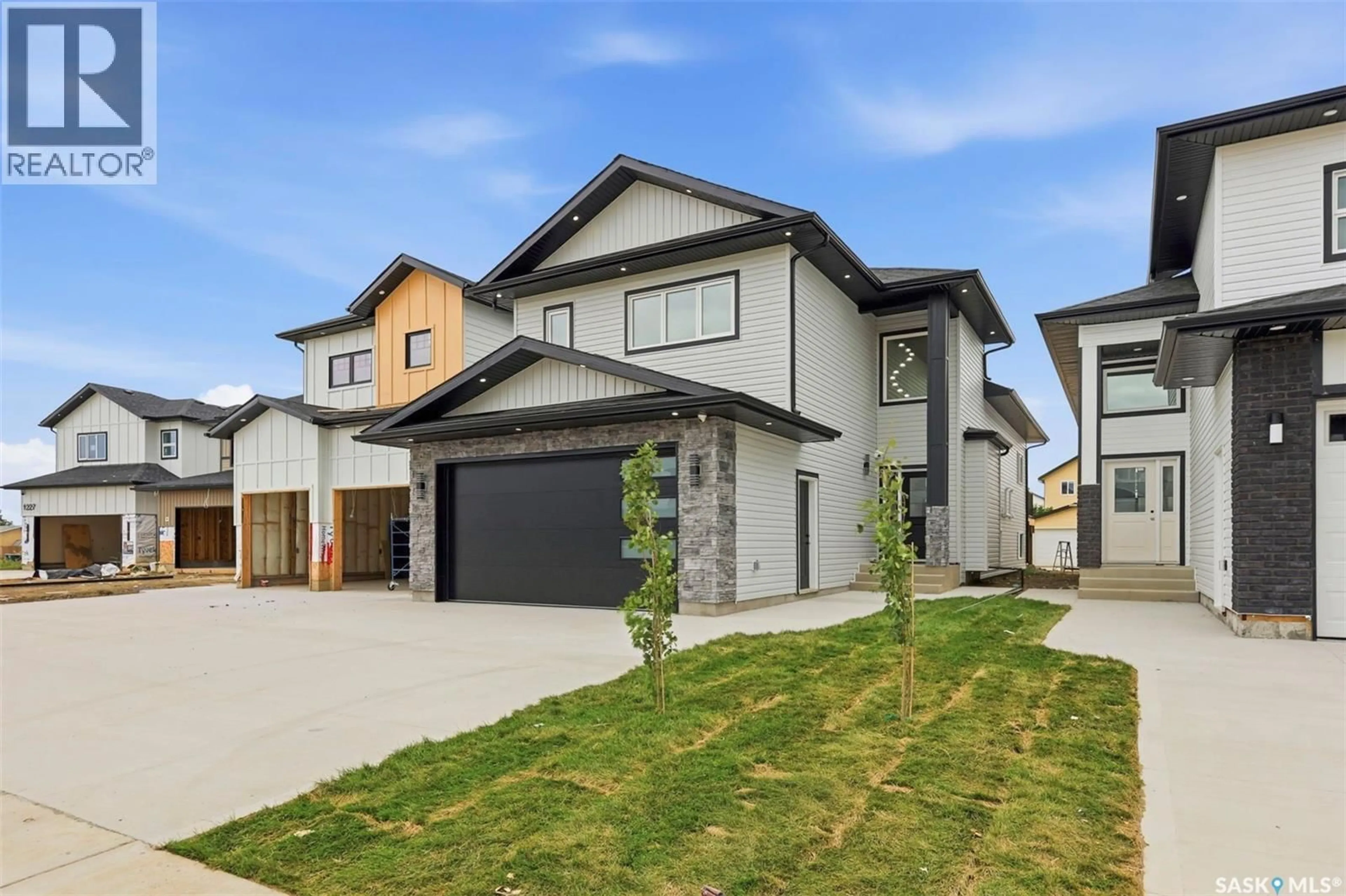 Home with brick exterior material, street for 1215 NIGHTINGALE TERACE, Saskatoon Saskatchewan S7L7R6